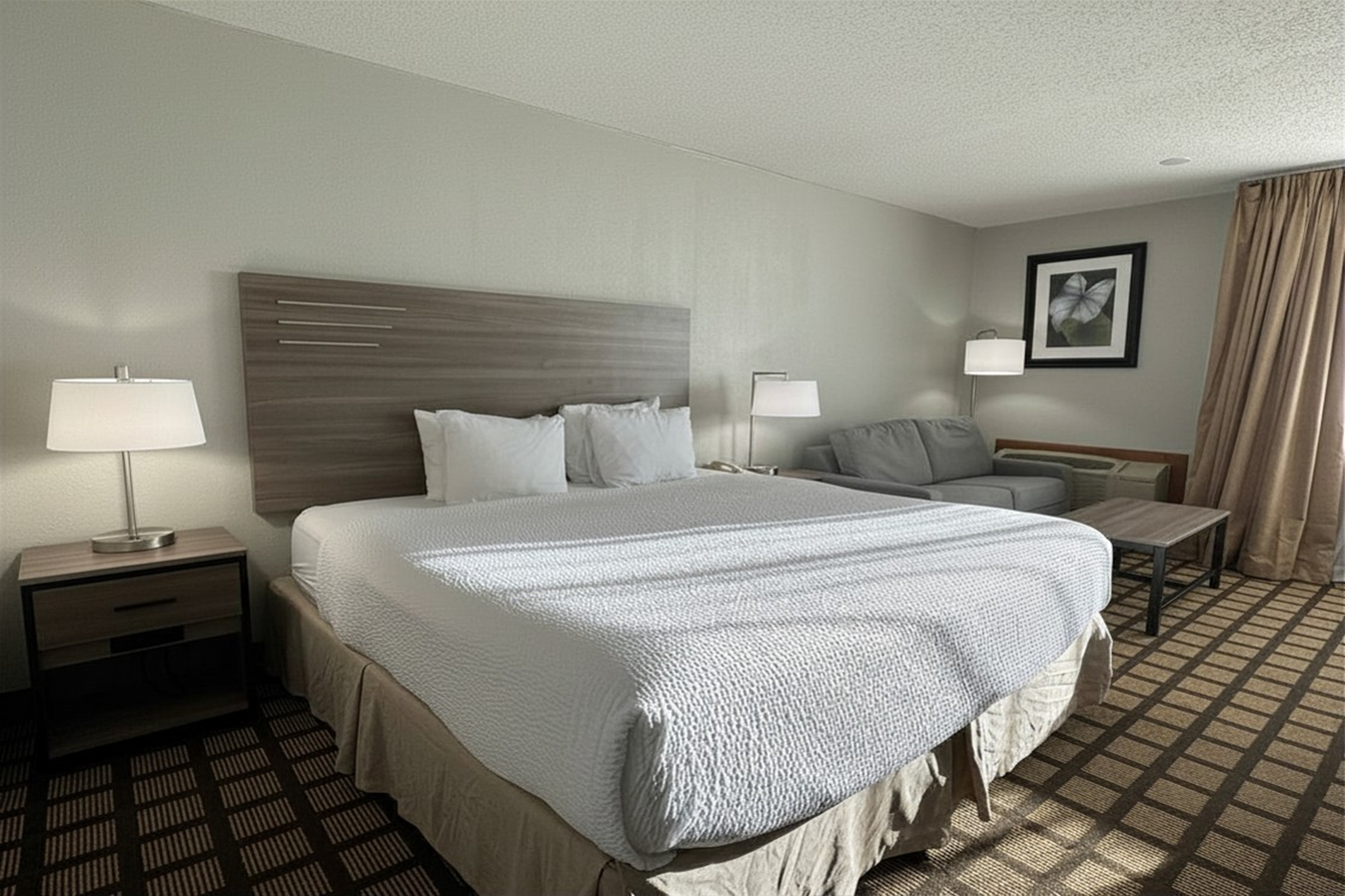Guest room at the Baymont by Wyndham Queensbury Lake George in Queensbury, New York