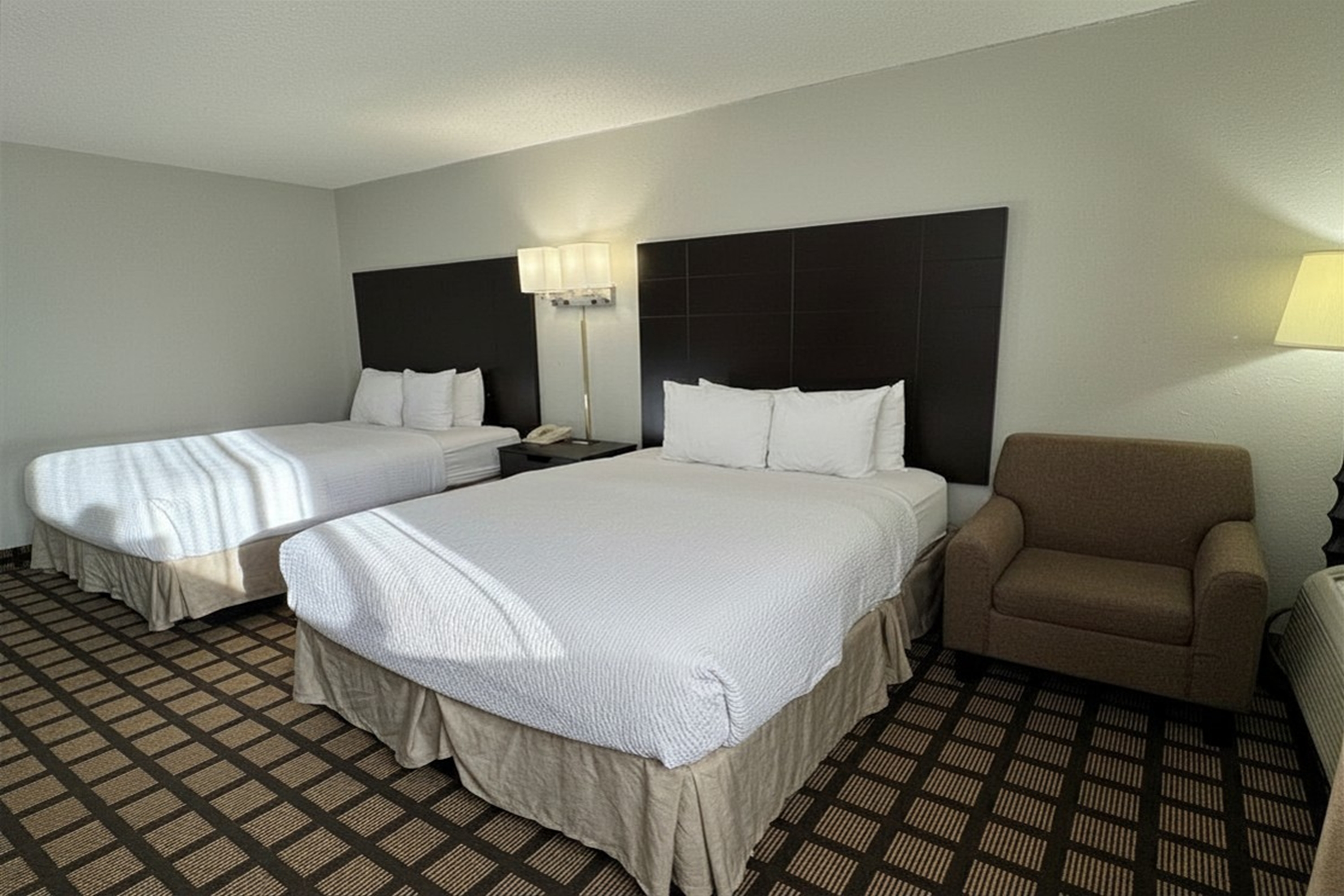 Guest room at the Baymont by Wyndham Queensbury Lake George in Queensbury, New York