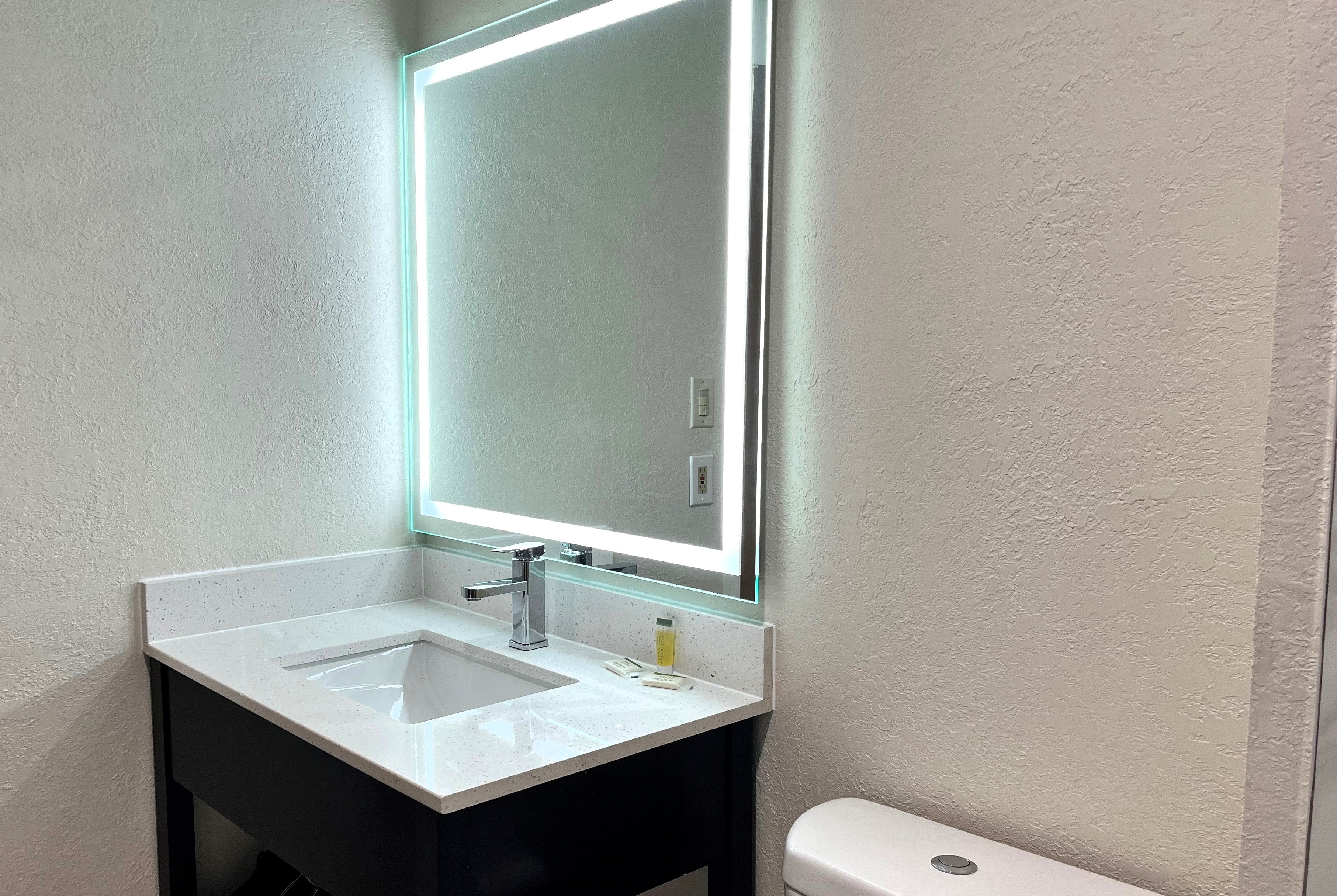 Guest room bath at the Baymont by Wyndham Cincinnati in Cincinnati, Ohio