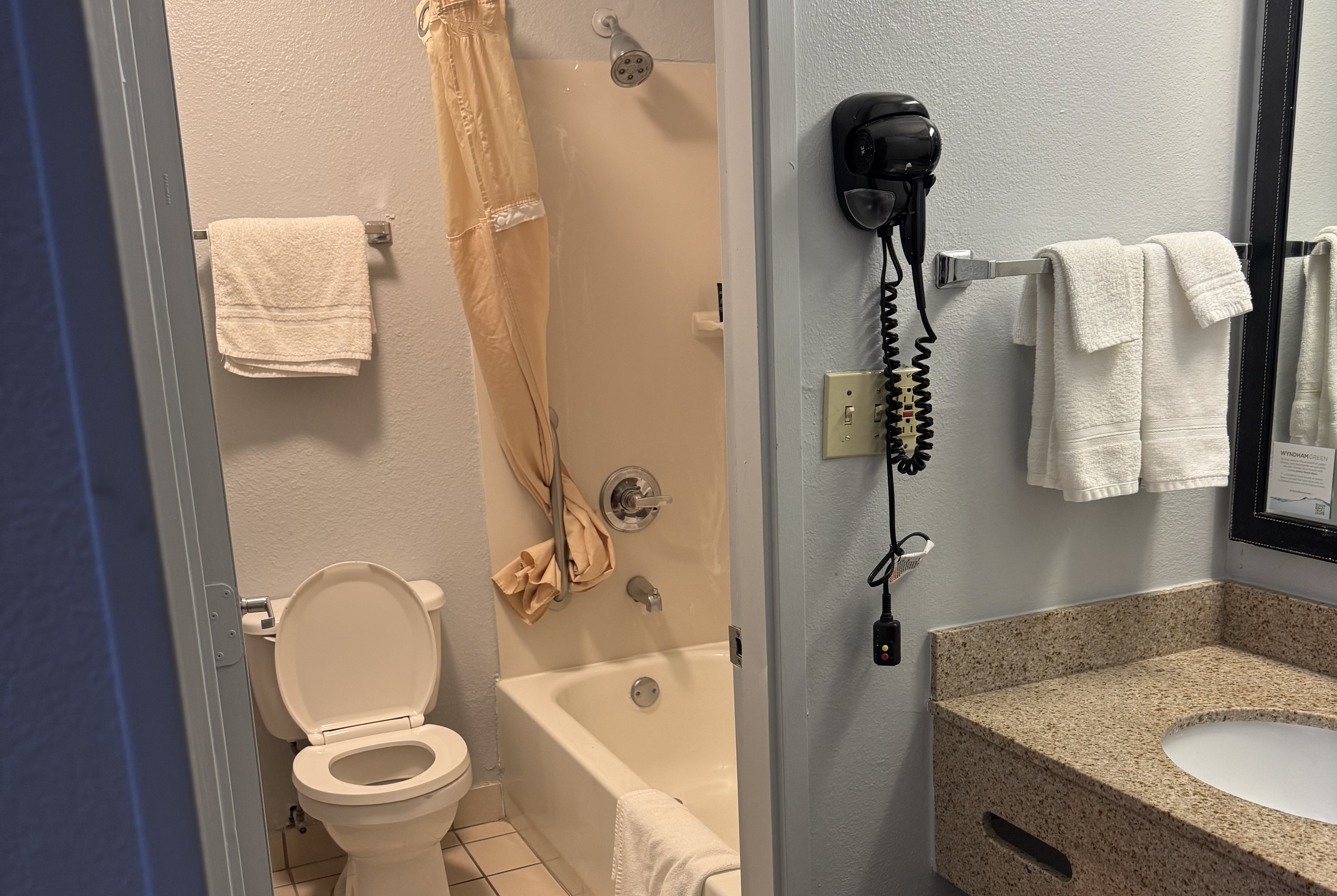 Guest room bath at the Baymont by Wyndham Dayton North in Dayton, Ohio