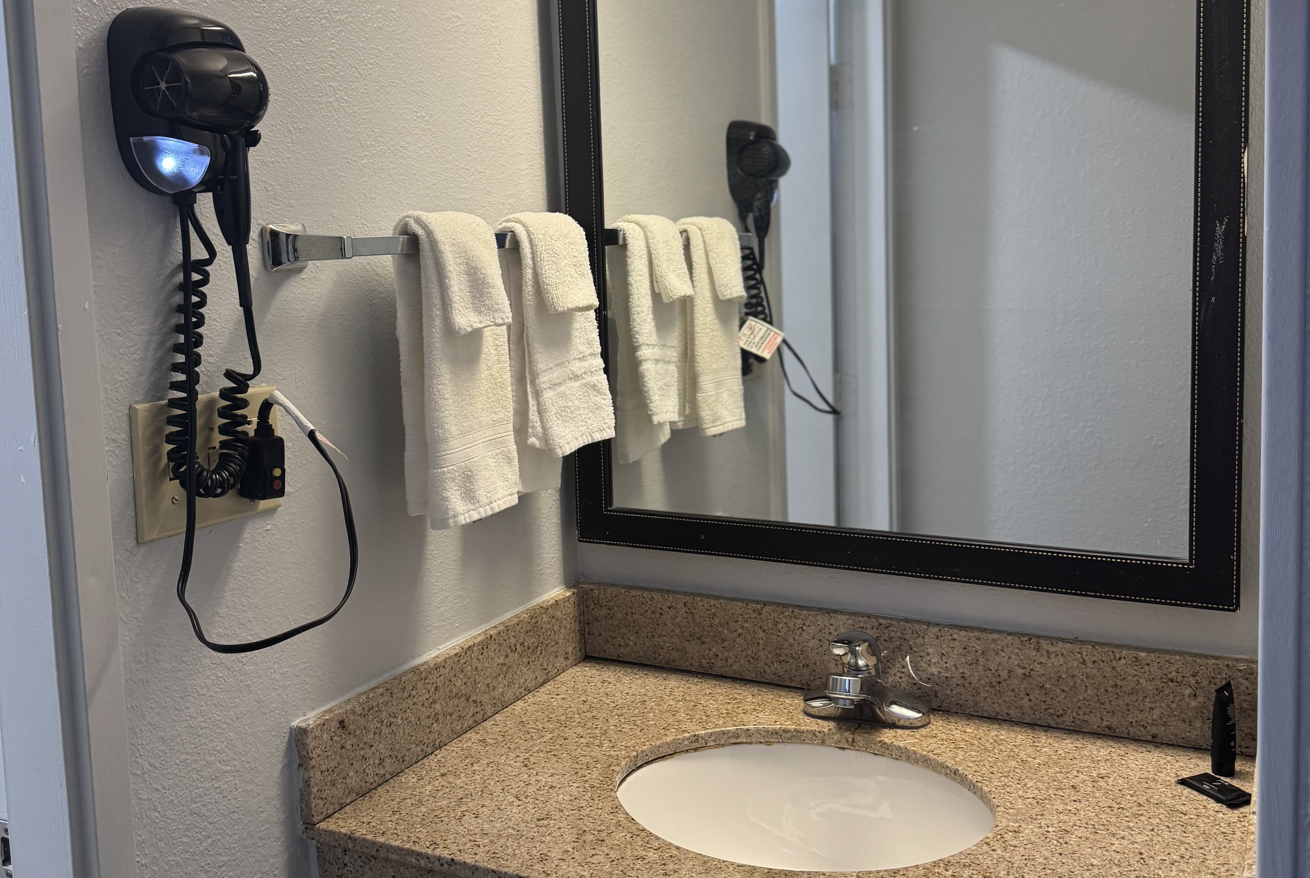Guest room bath at the Baymont by Wyndham Dayton North in Dayton, Ohio