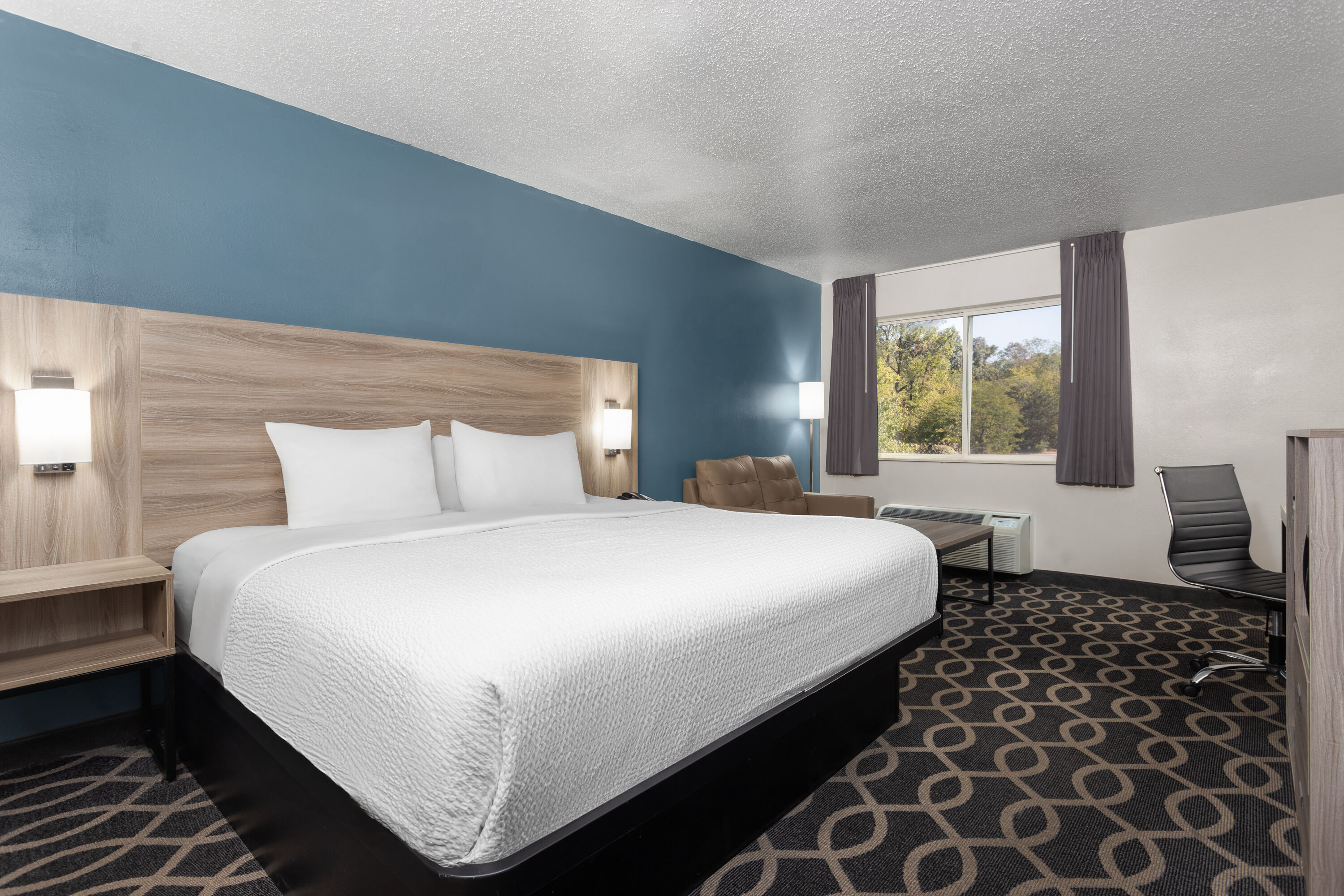 Guest room at the Baymont by Wyndham Piqua in Piqua, Ohio