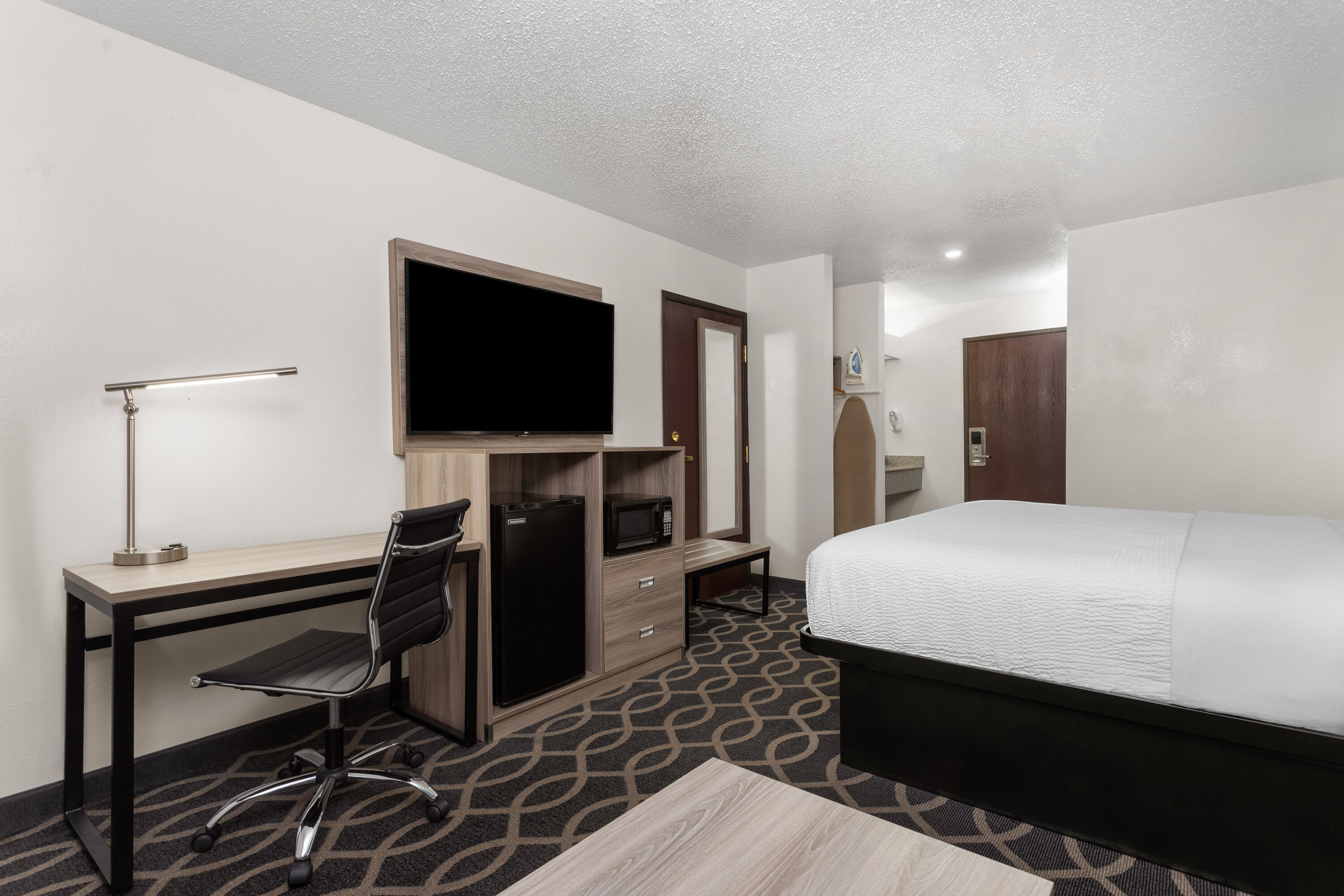 Guest room at the Baymont by Wyndham Piqua in Piqua, Ohio