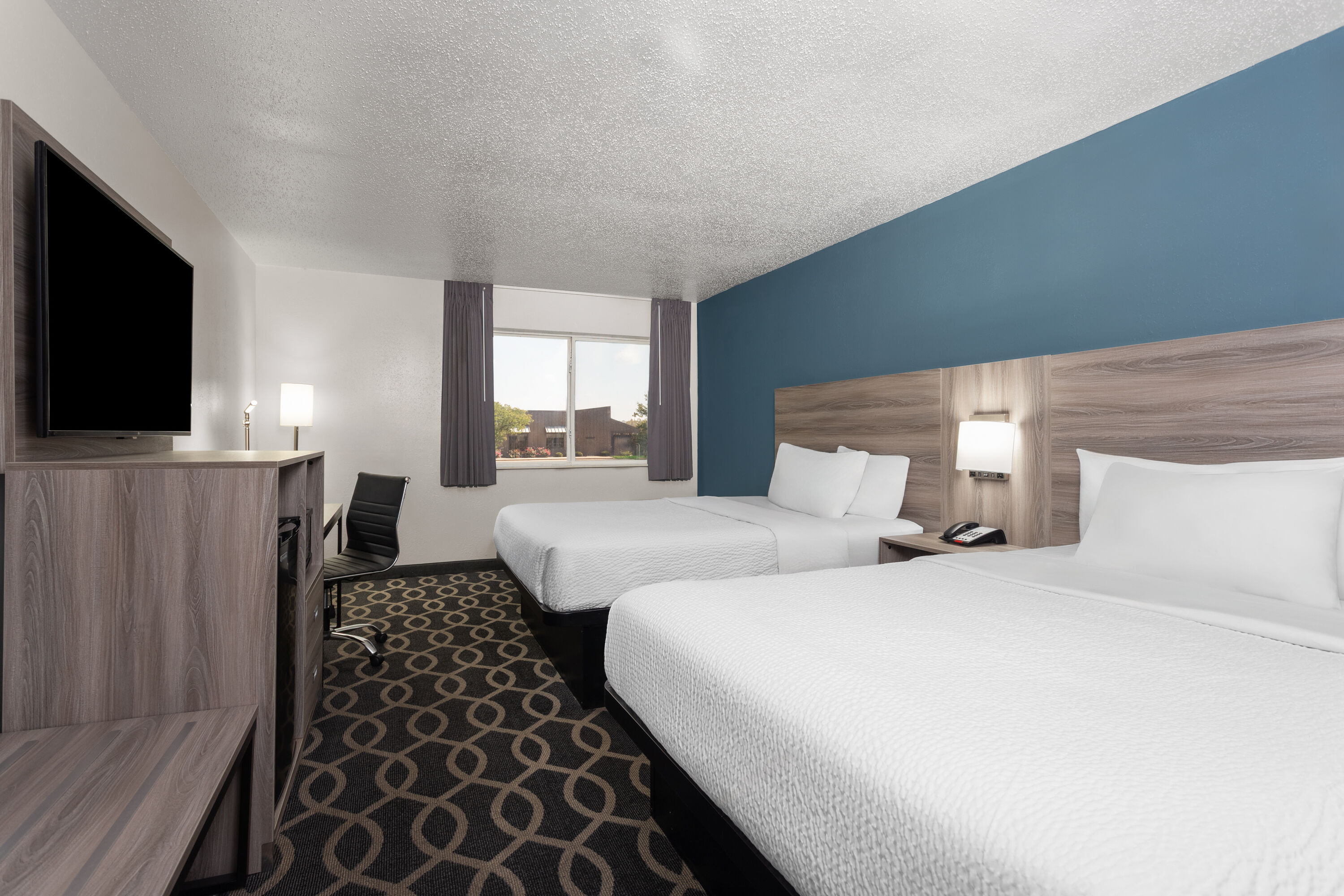Guest room at the Baymont by Wyndham Piqua in Piqua, Ohio