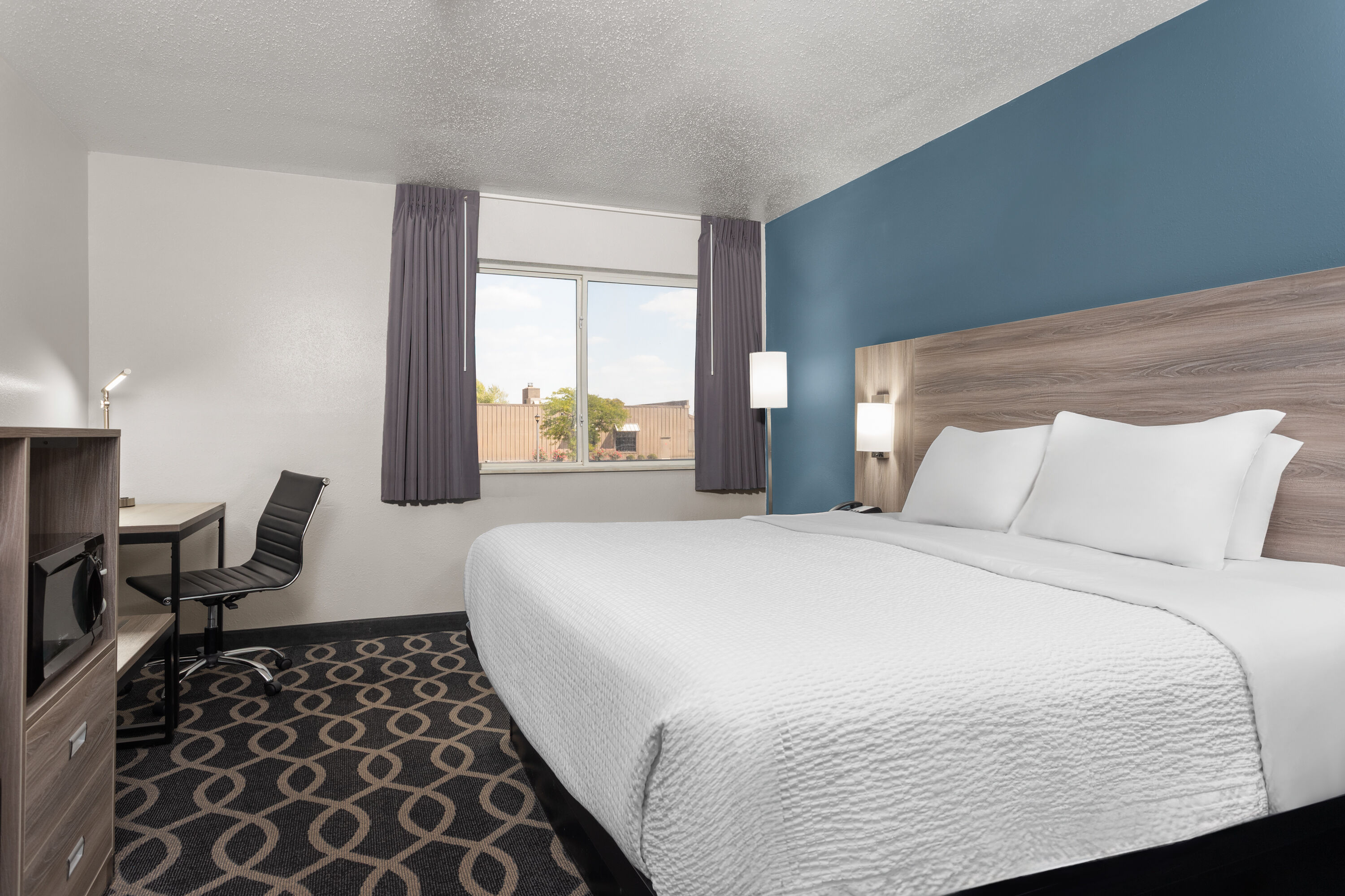 Guest room at the Baymont by Wyndham Piqua in Piqua, Ohio