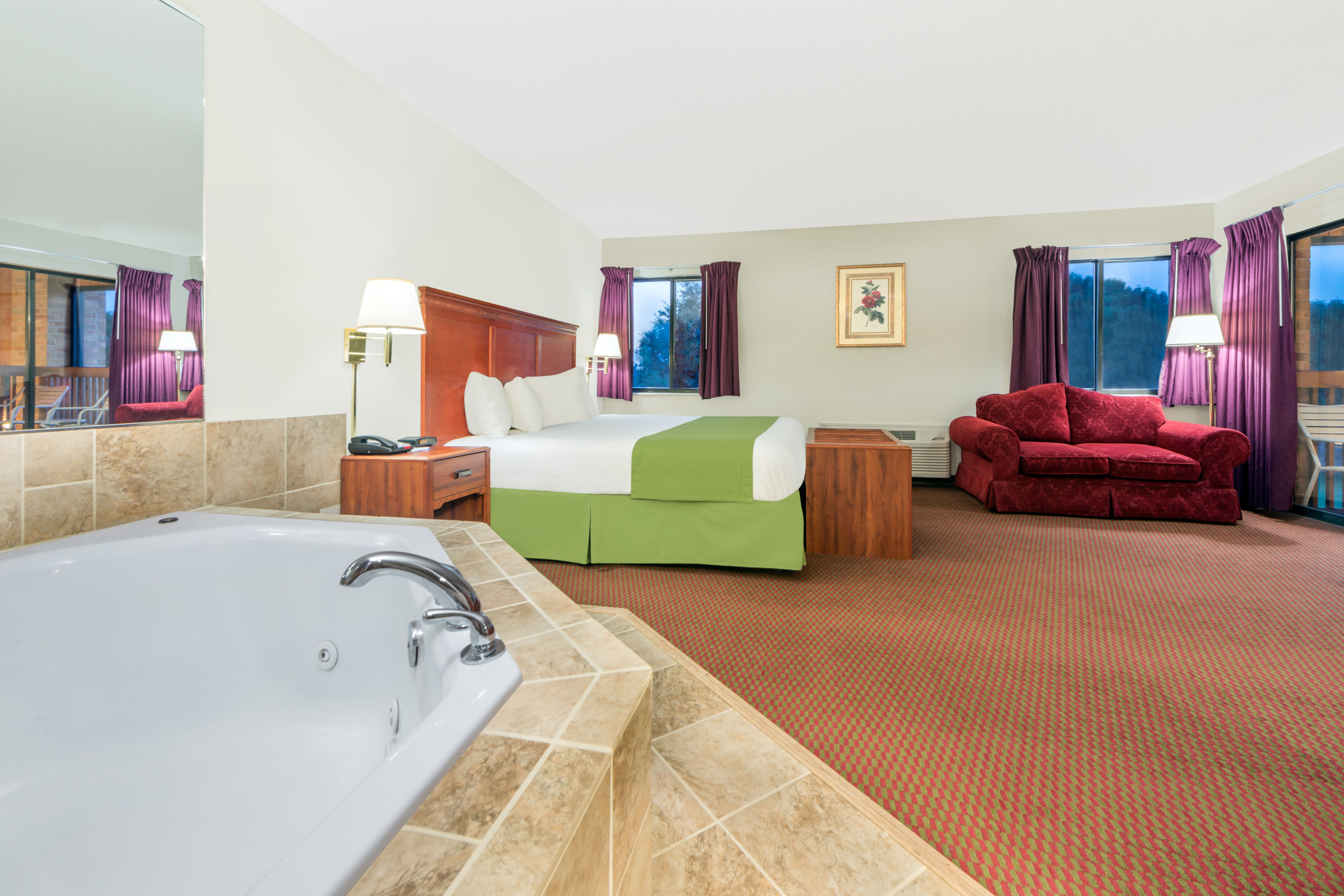 Guest room at the Baymont by Wyndham Enid in Enid, Oklahoma