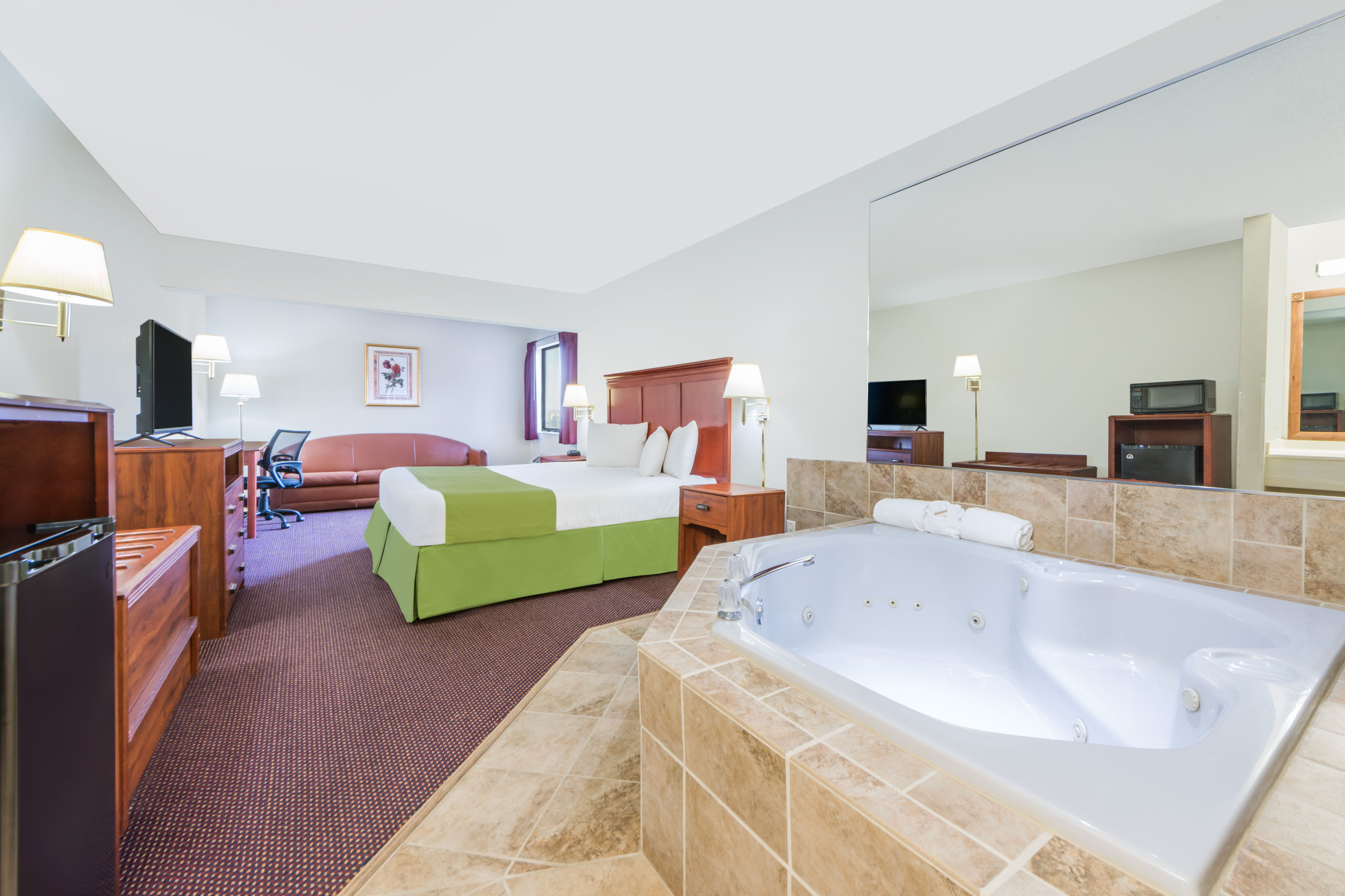 Guest room at the Baymont by Wyndham Enid in Enid, Oklahoma