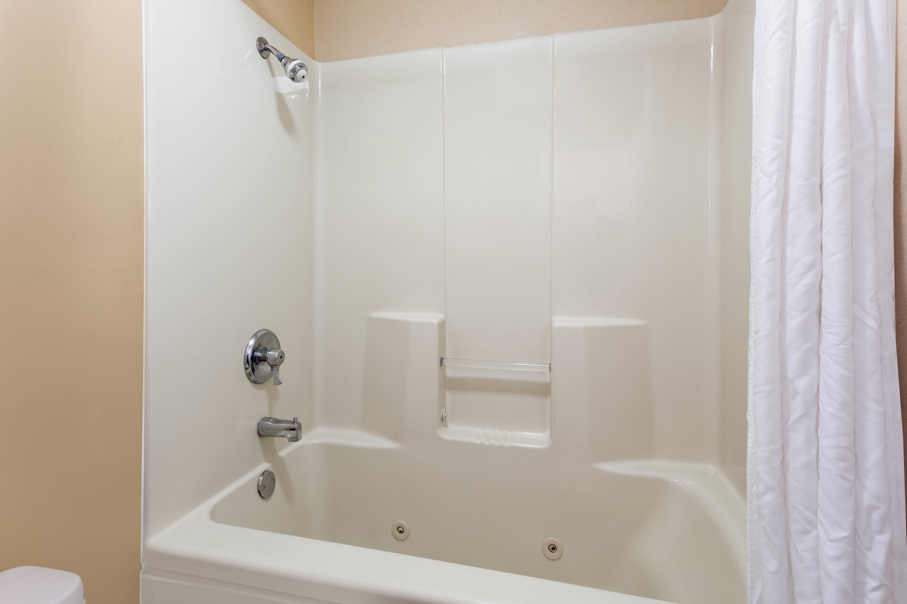 Guest room bath at the Baymont by Wyndham Easley/Greenville in Easley, South Carolina