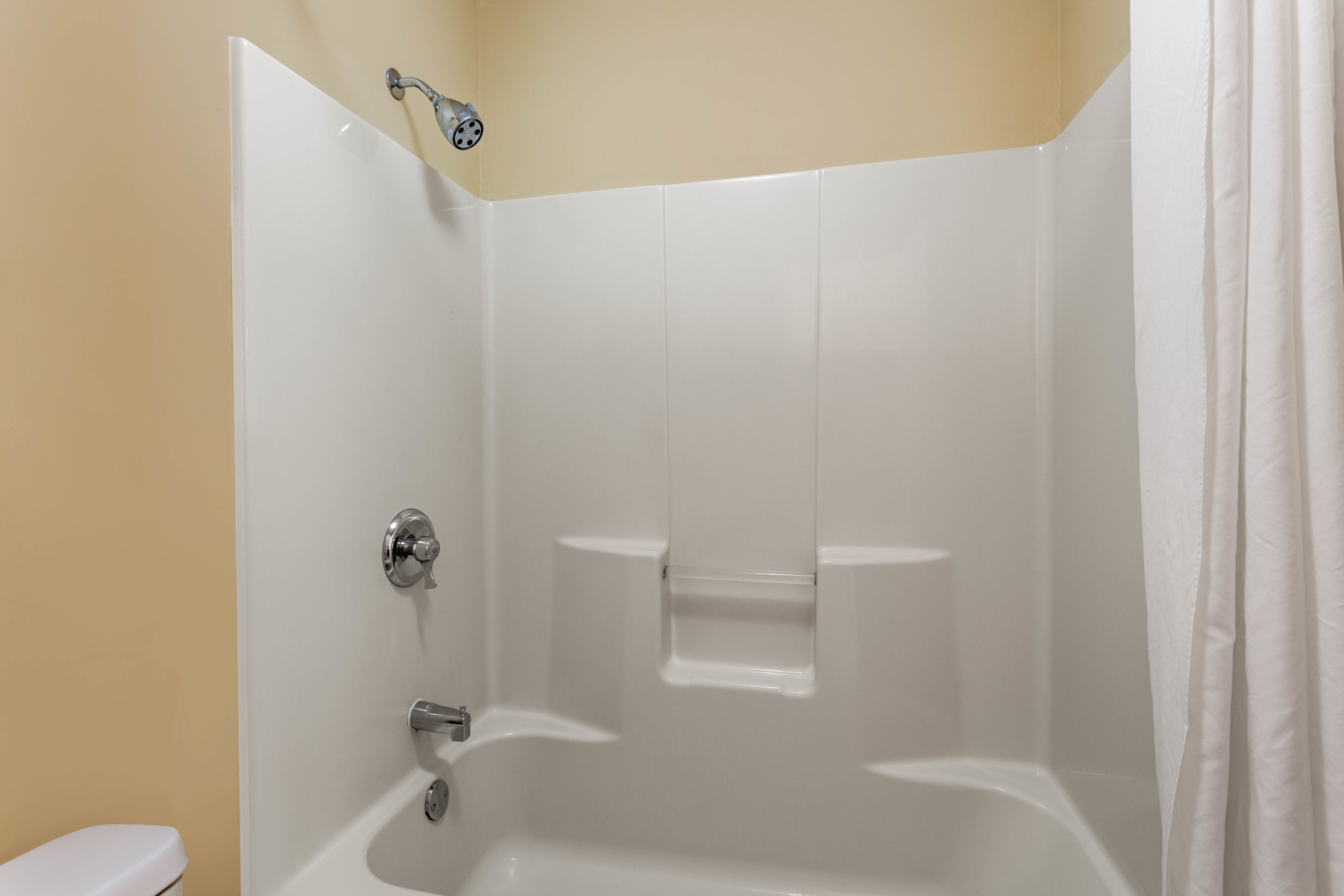 Guest room bath at the Baymont by Wyndham Easley/Greenville in Easley, South Carolina
