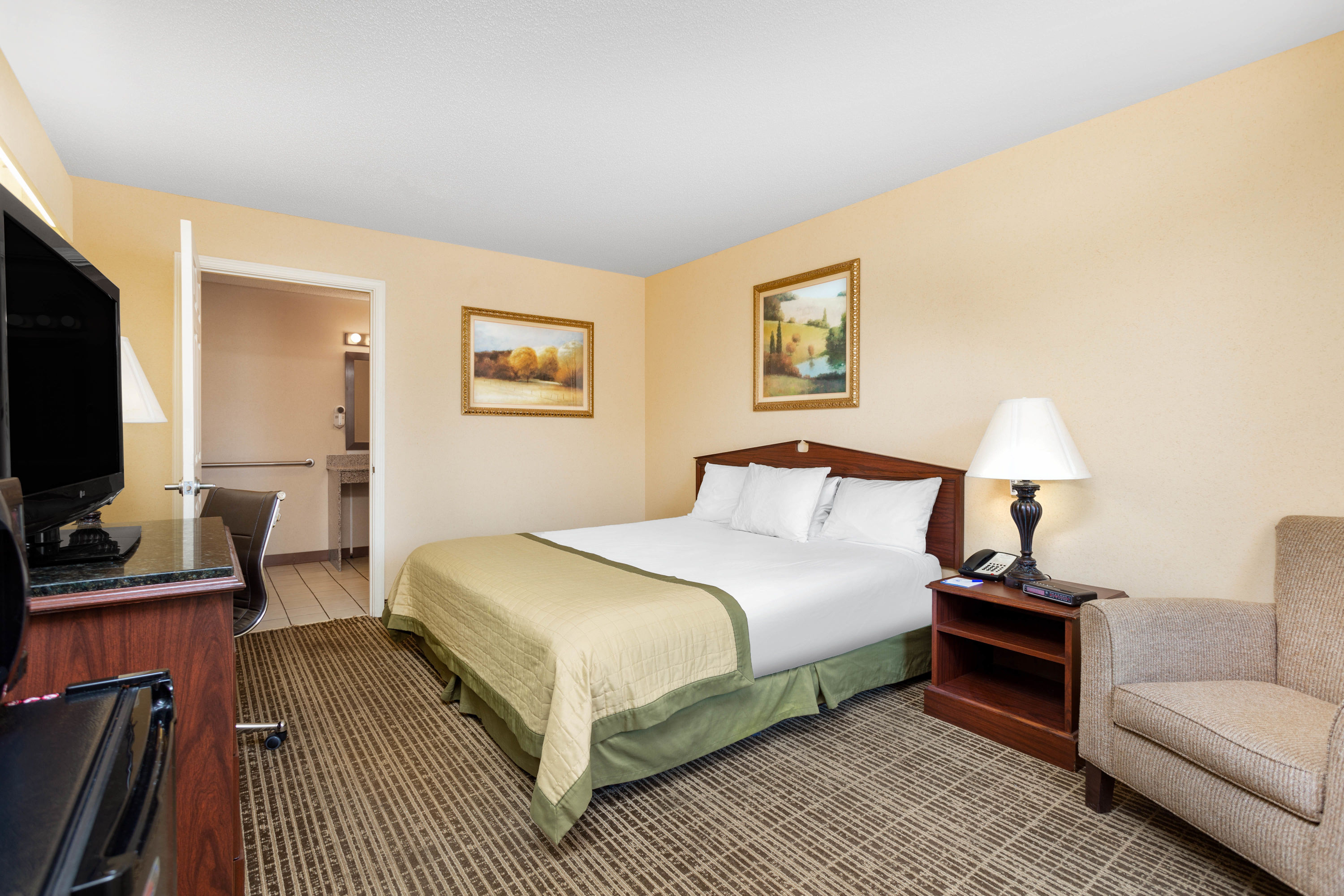 Guest room at the Baymont by Wyndham Easley/Greenville in Easley, South Carolina