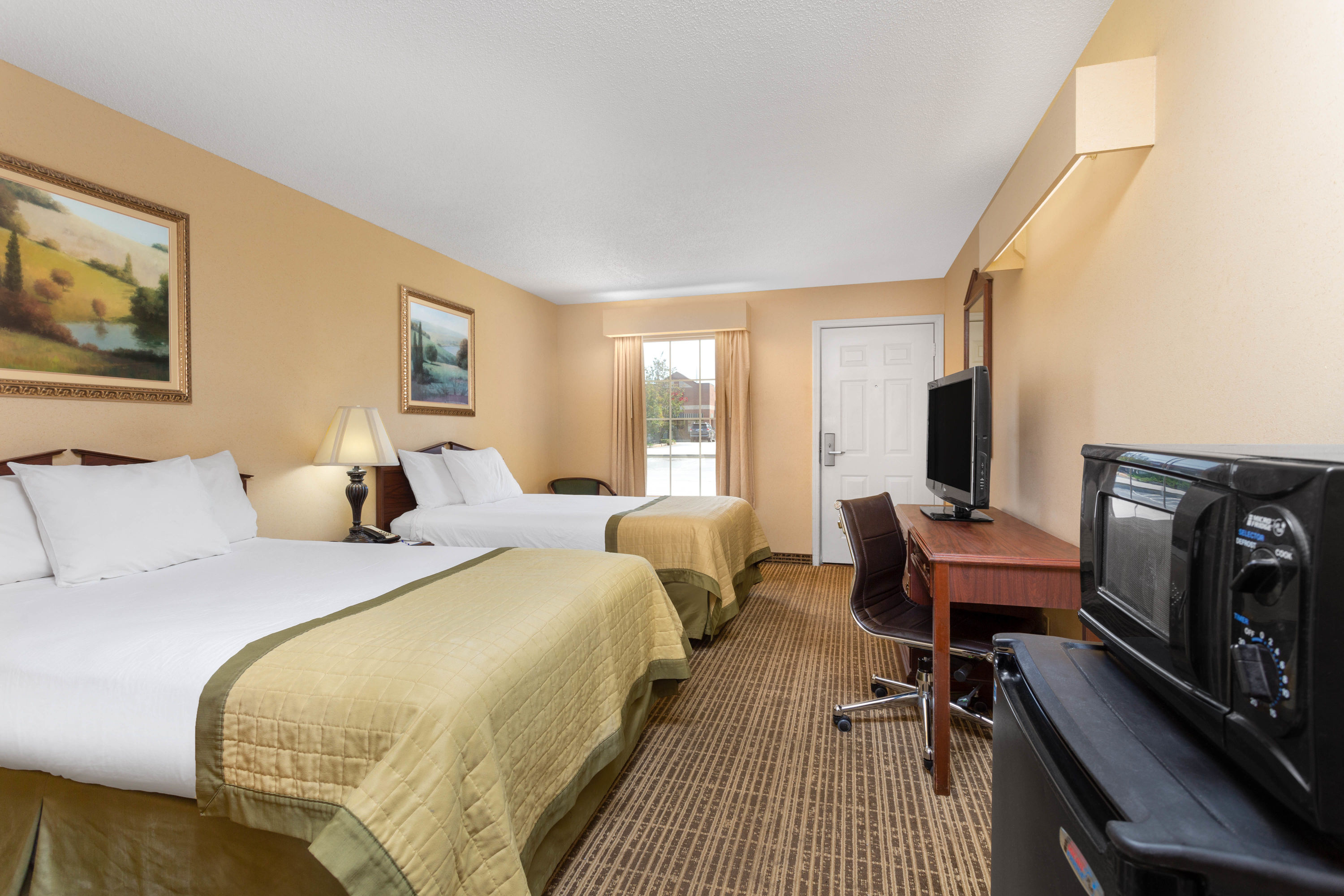 Guest room at the Baymont by Wyndham Easley/Greenville in Easley, South Carolina