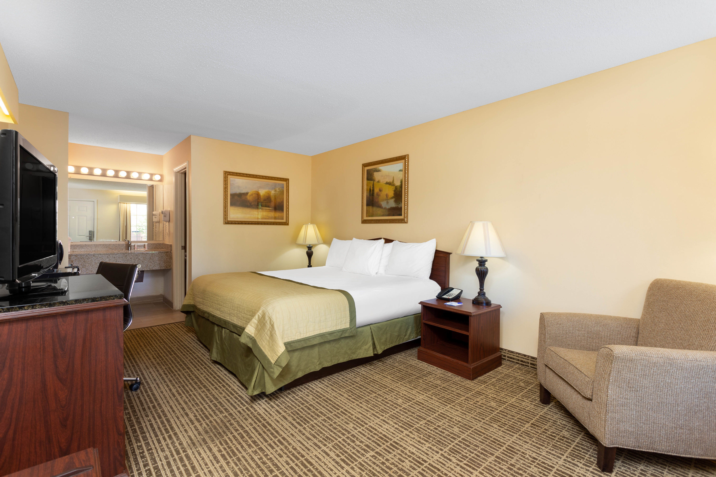 Guest room at the Baymont by Wyndham Easley/Greenville in Easley, South Carolina