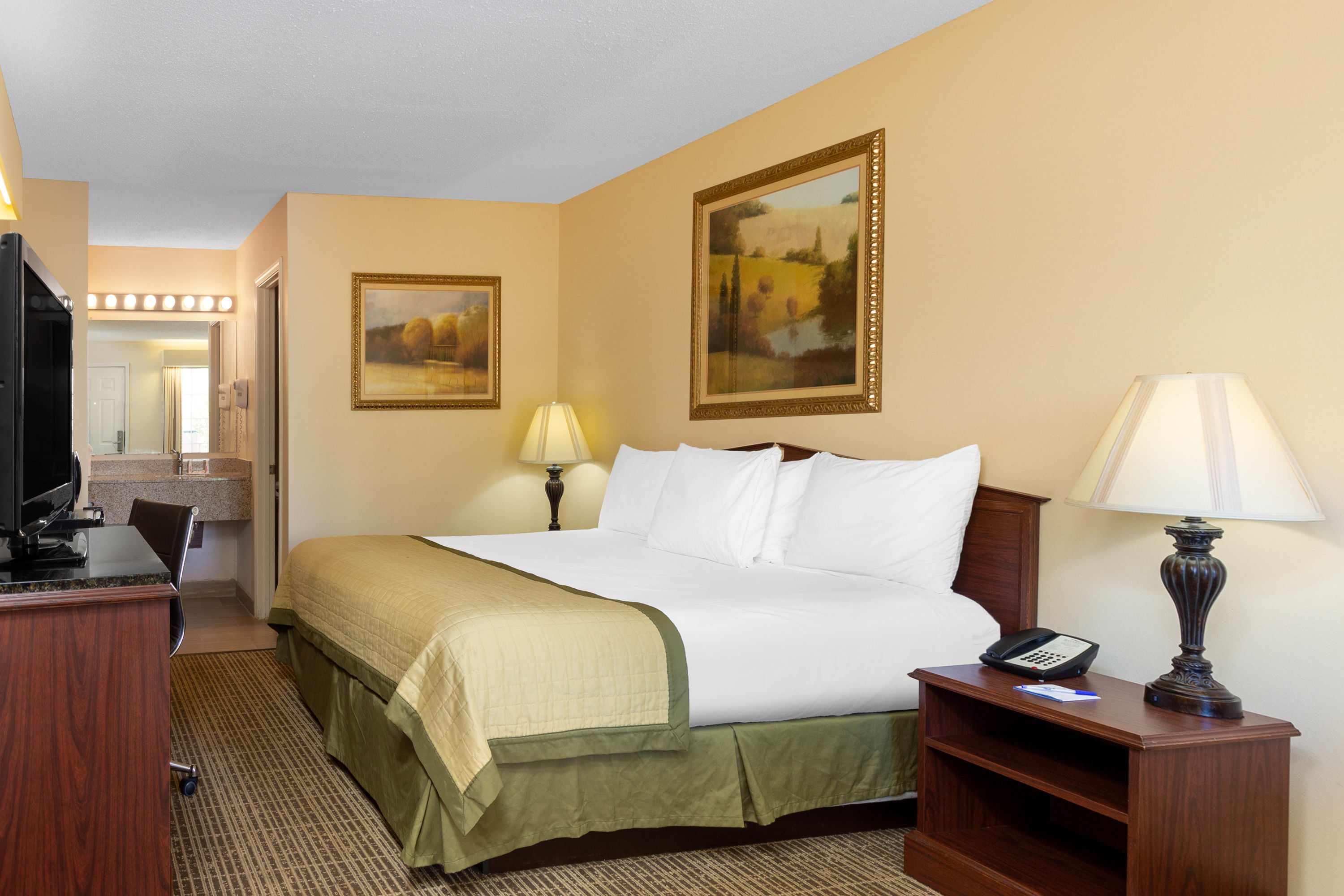 Guest room at the Baymont by Wyndham Easley/Greenville in Easley, South Carolina