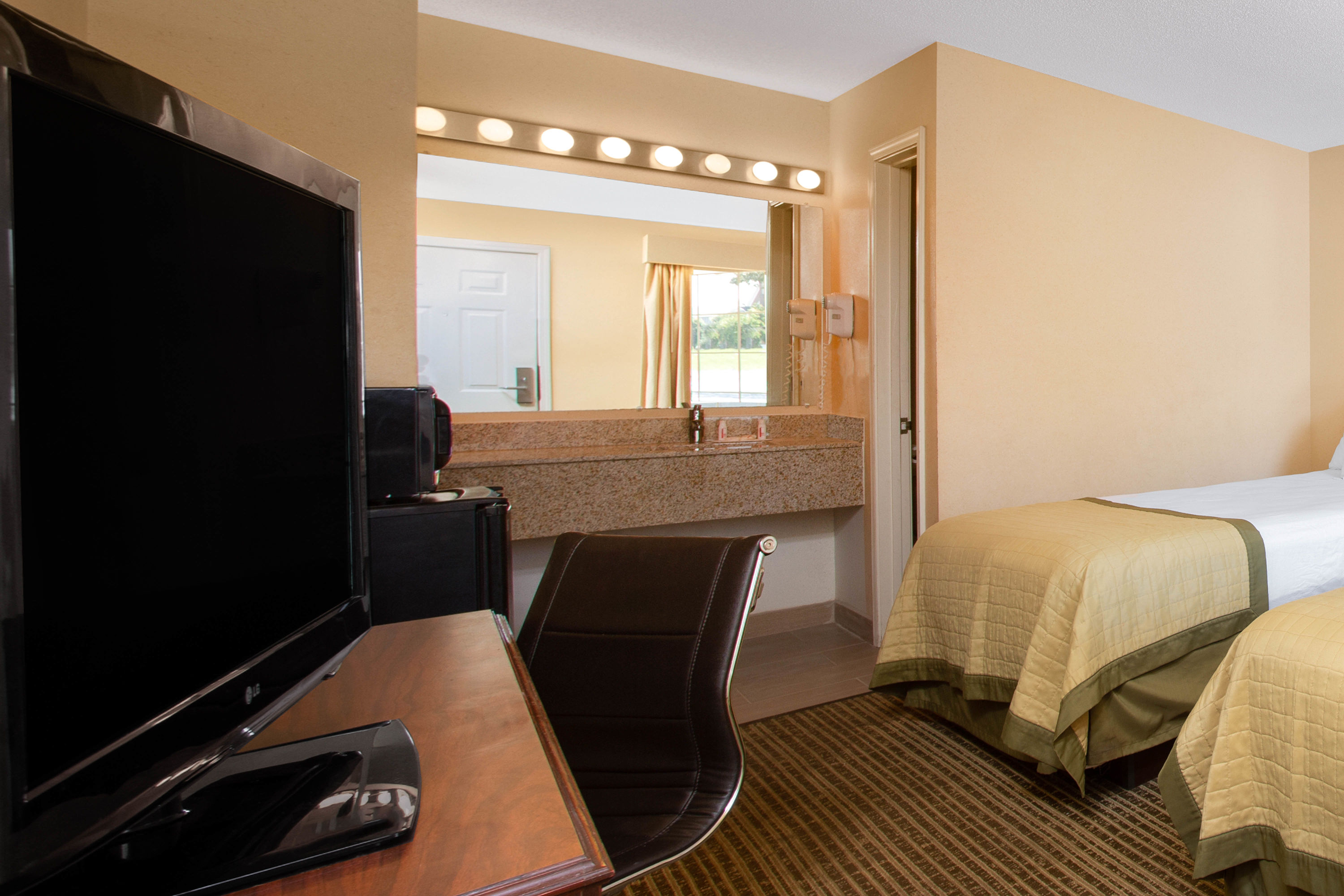 Guest room at the Baymont by Wyndham Easley/Greenville in Easley, South Carolina