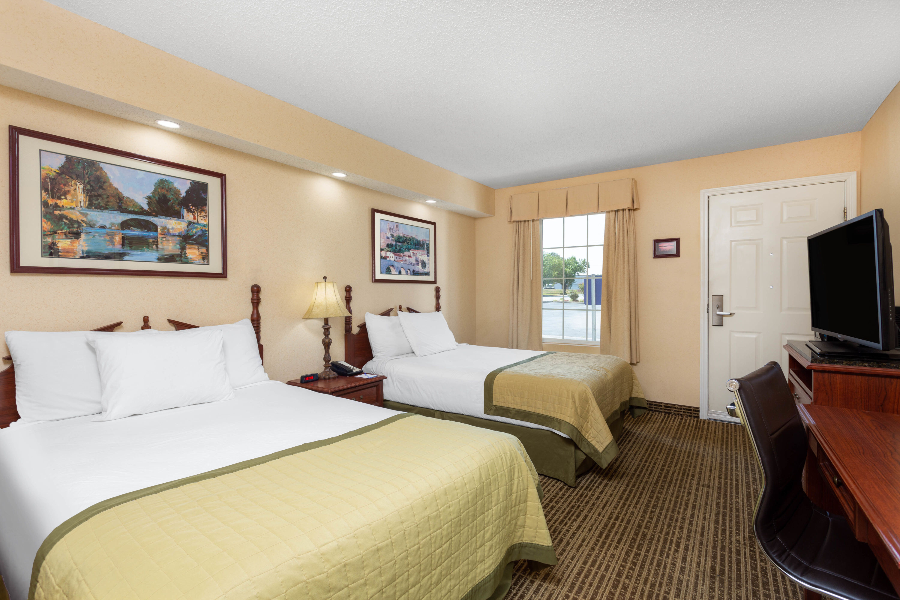 Guest room at the Baymont by Wyndham Easley/Greenville in Easley, South Carolina