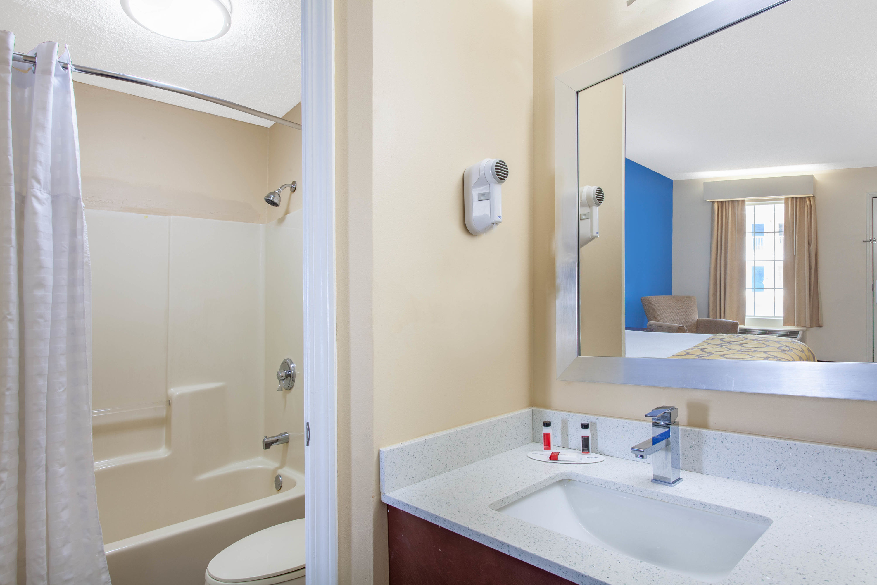 Guest room bath at the Baymont by Wyndham Greenwood in Greenwood, South Carolina