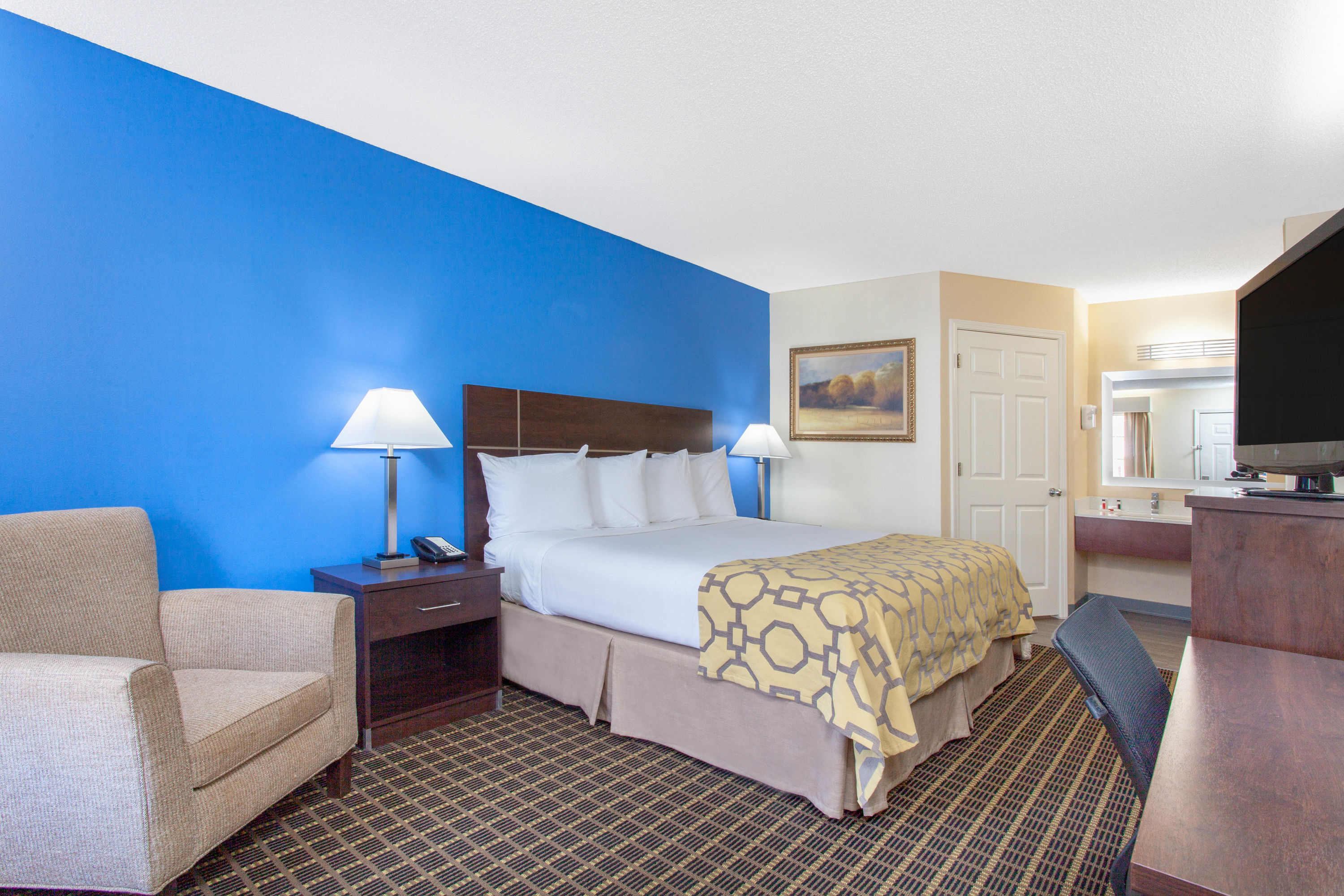 Guest room at the Baymont by Wyndham Greenwood in Greenwood, South Carolina