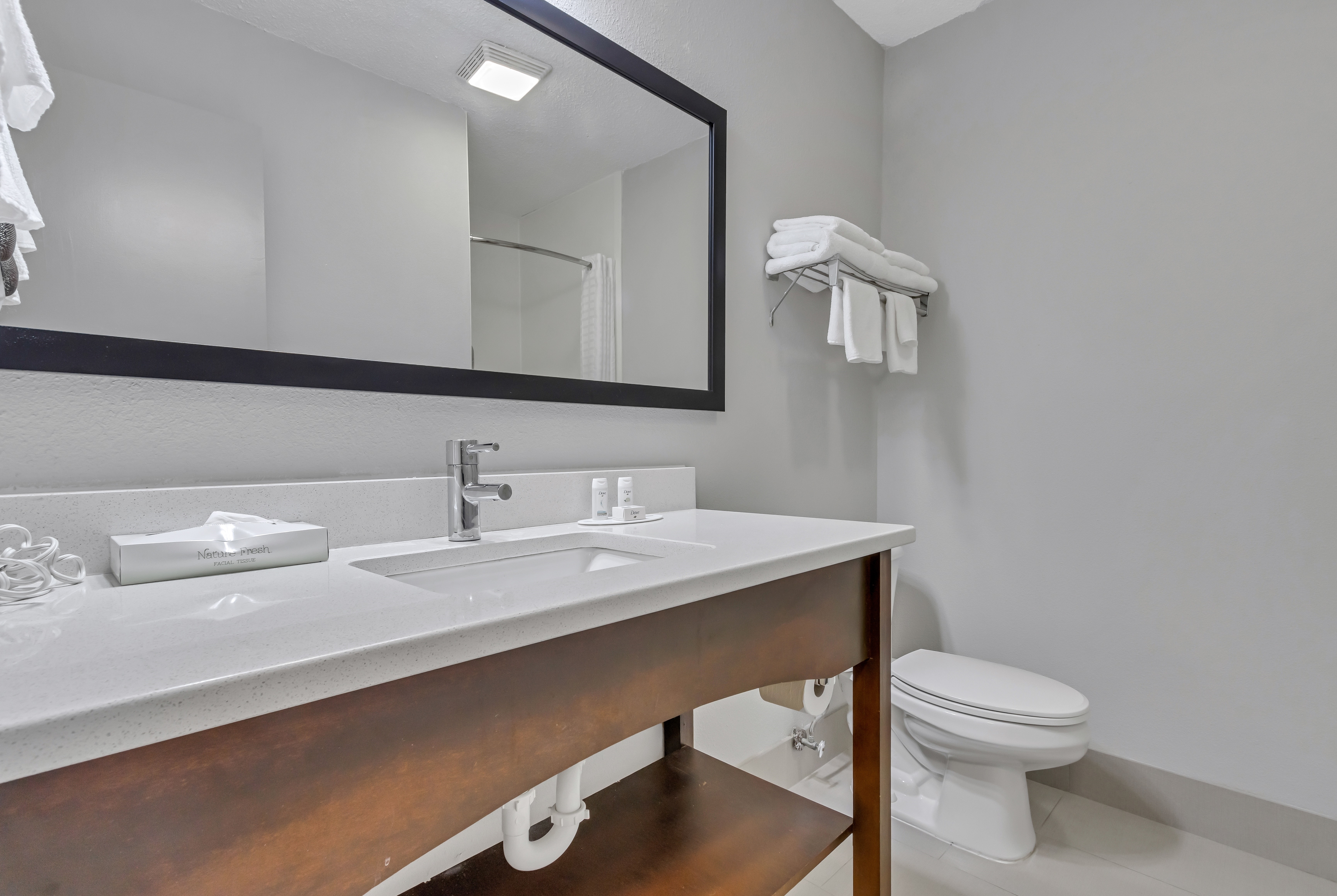 Guest room bath at the Baymont by Wyndham North Myrtle Beach in North Myrtle Beach, South Carolina