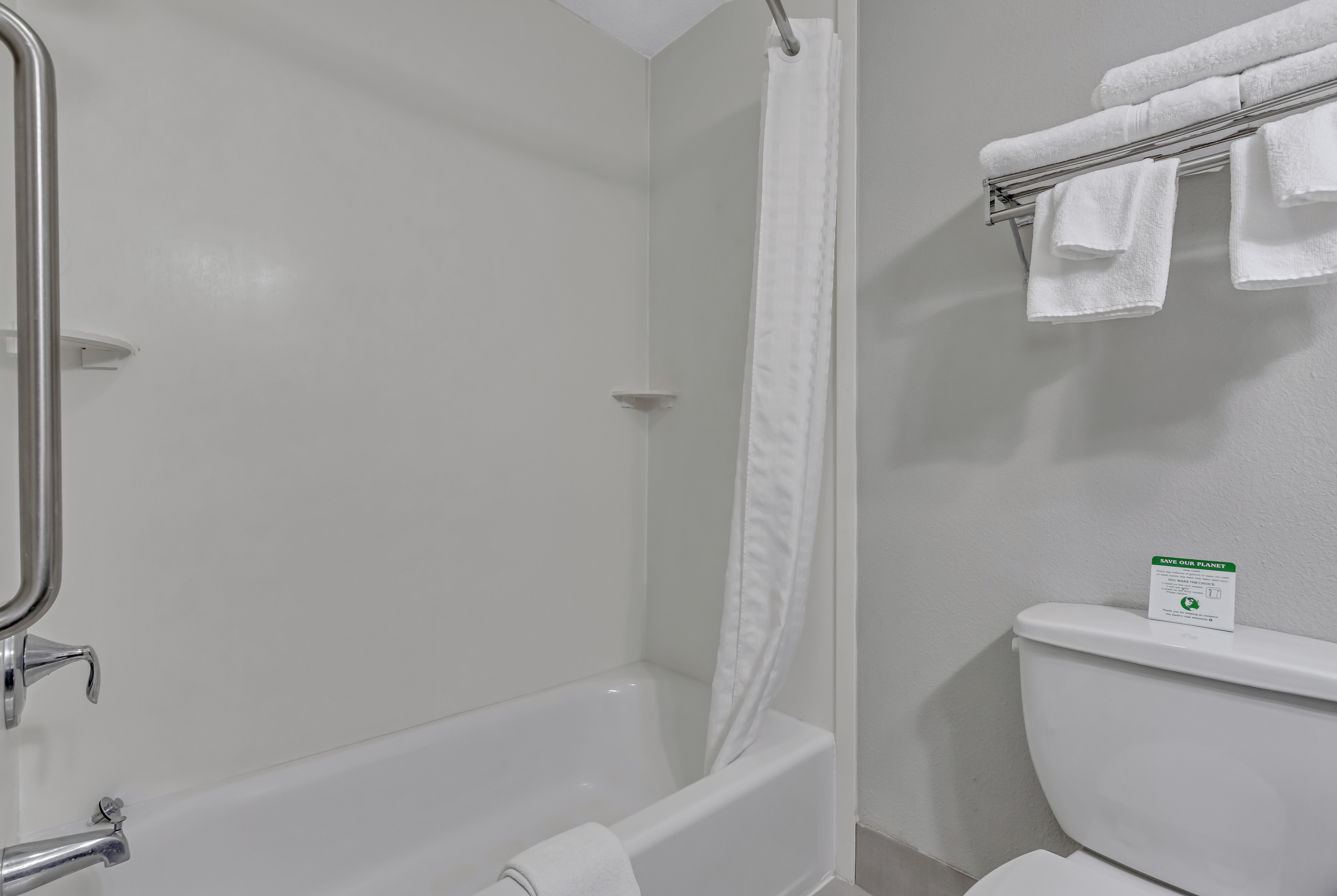 Guest room bath at the Baymont by Wyndham North Myrtle Beach in North Myrtle Beach, South Carolina