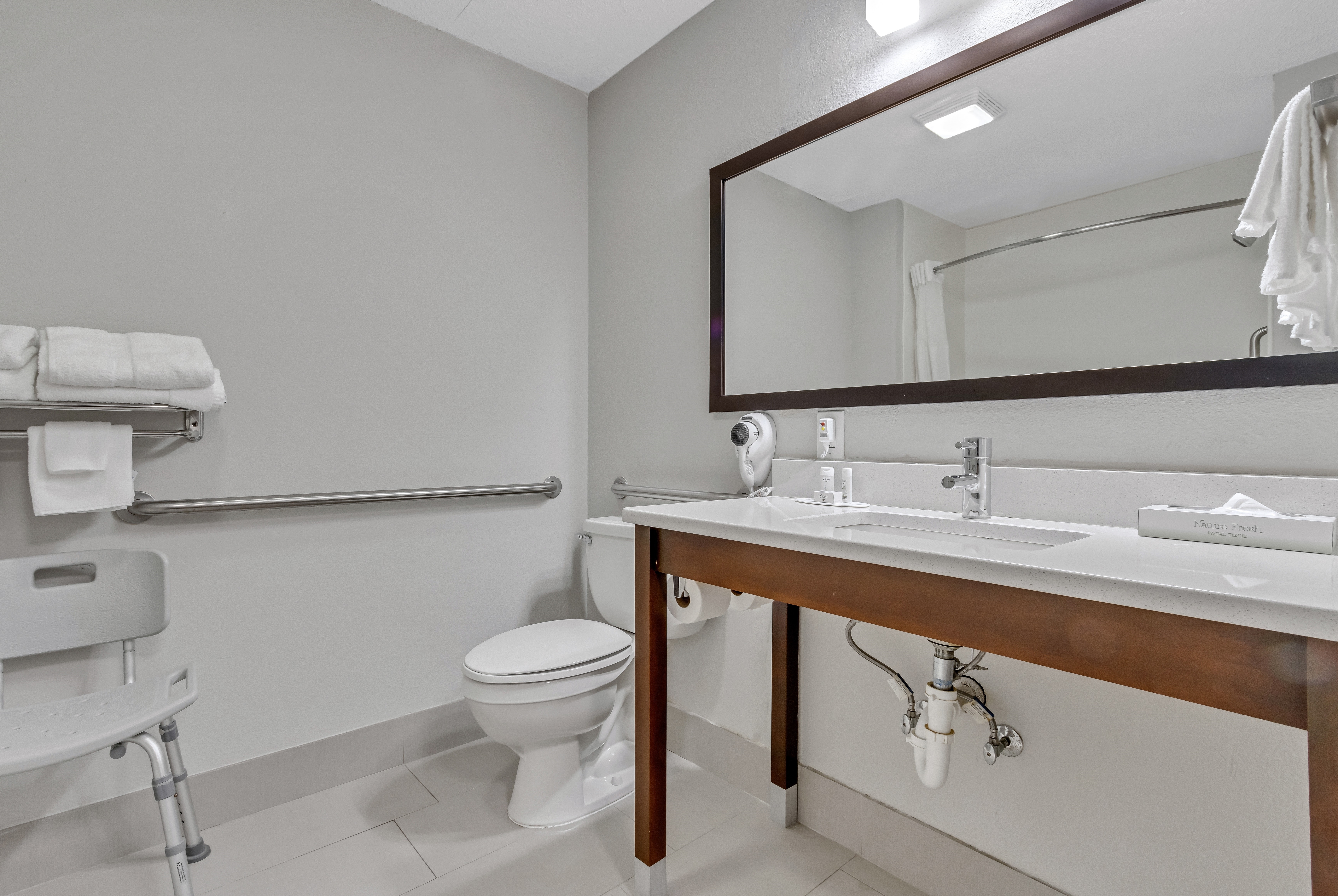 Guest room bath at the Baymont by Wyndham North Myrtle Beach in North Myrtle Beach, South Carolina