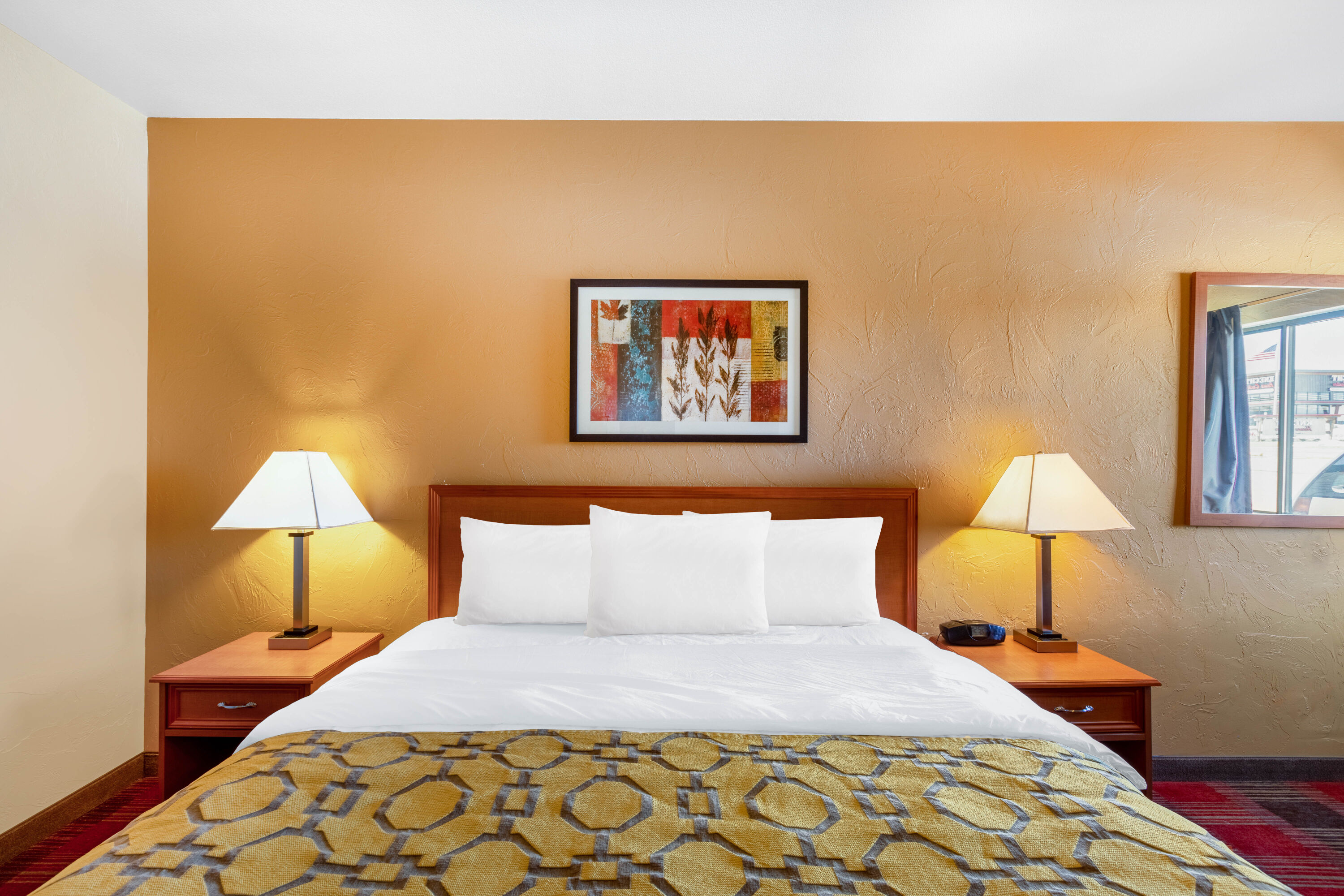 Guest room at the Baymont by Wyndham Spearfish in Spearfish, South Dakota