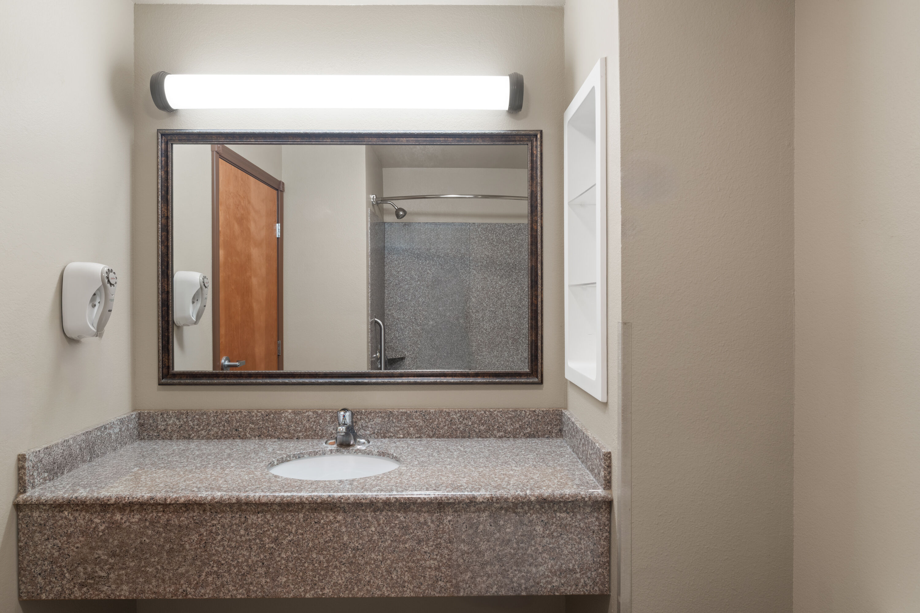 Guest room bath at the Baymont Inn & Suites by Wyndham Sturgis in Sturgis, South Dakota