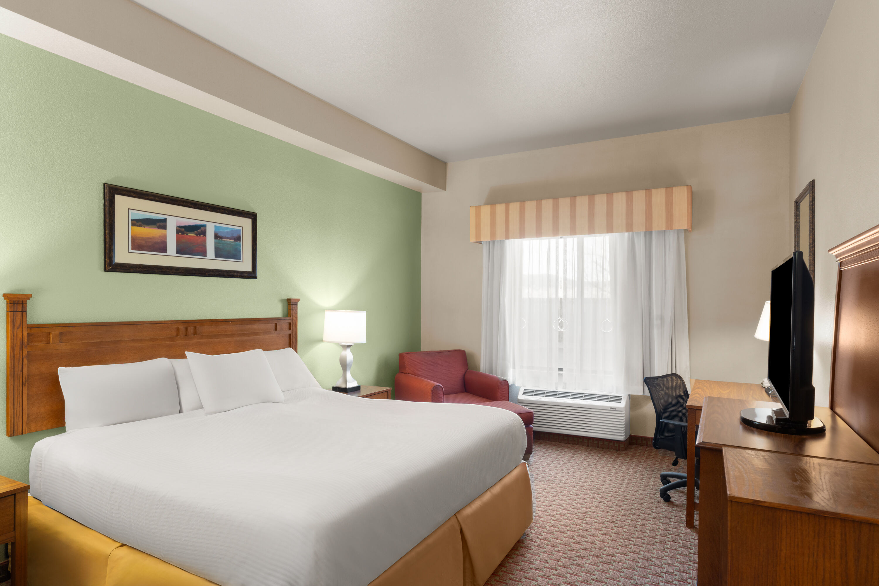 Guest room at the Baymont Inn & Suites by Wyndham Sturgis in Sturgis, South Dakota