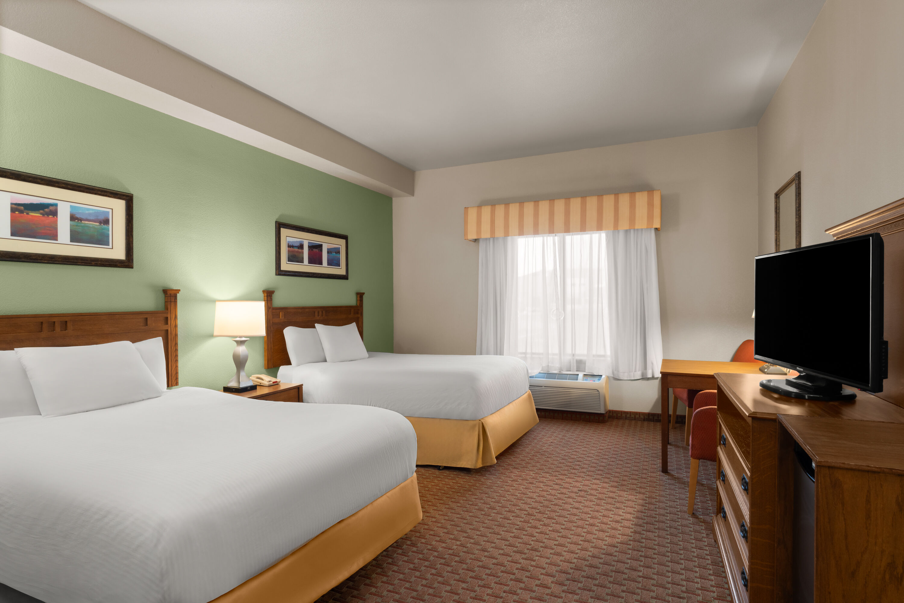 Guest room at the Baymont Inn & Suites by Wyndham Sturgis in Sturgis, South Dakota