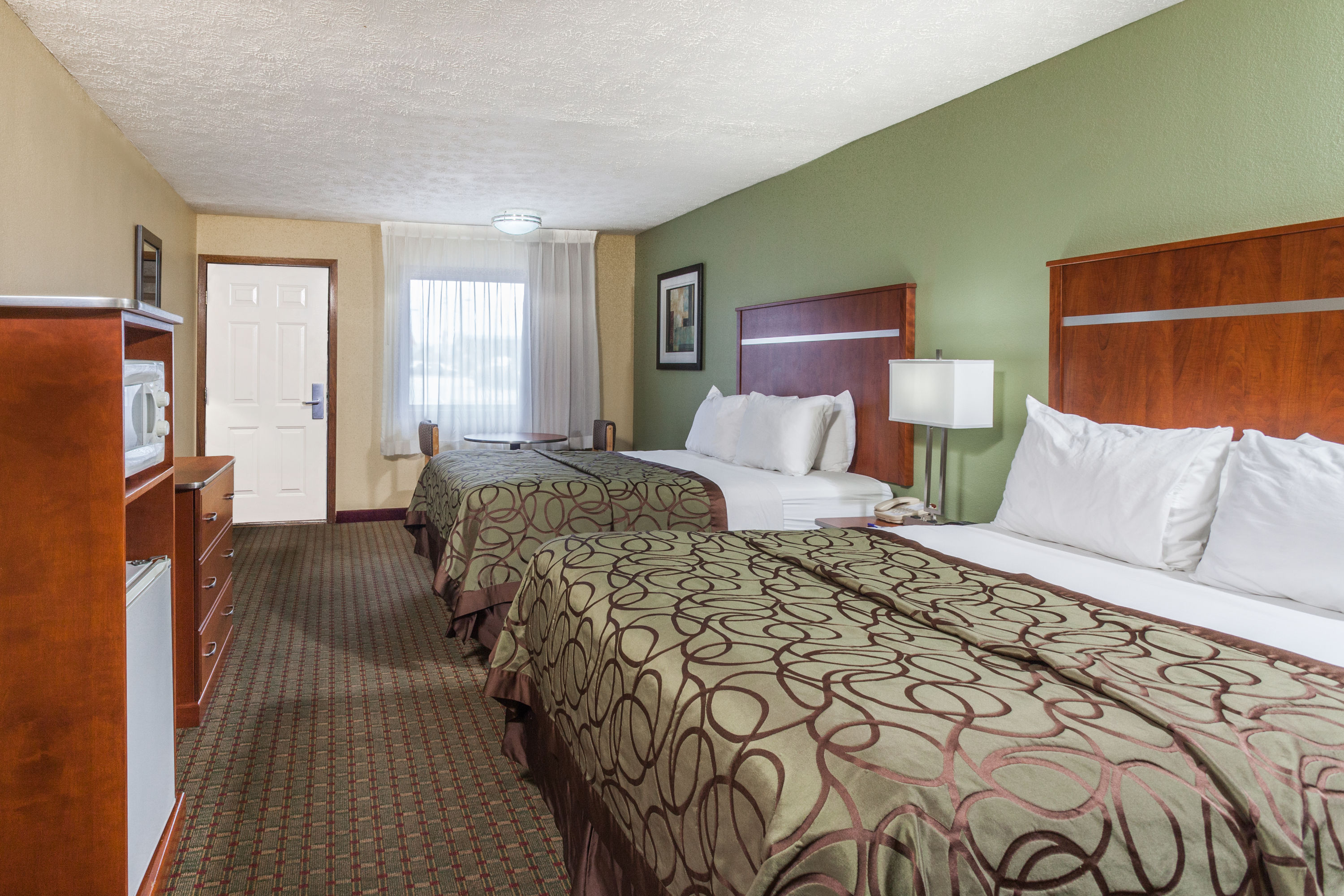 Guest room at the Baymont by Wyndham Pigeon Forge near Island Drive in Pigeon Forge, Tennessee