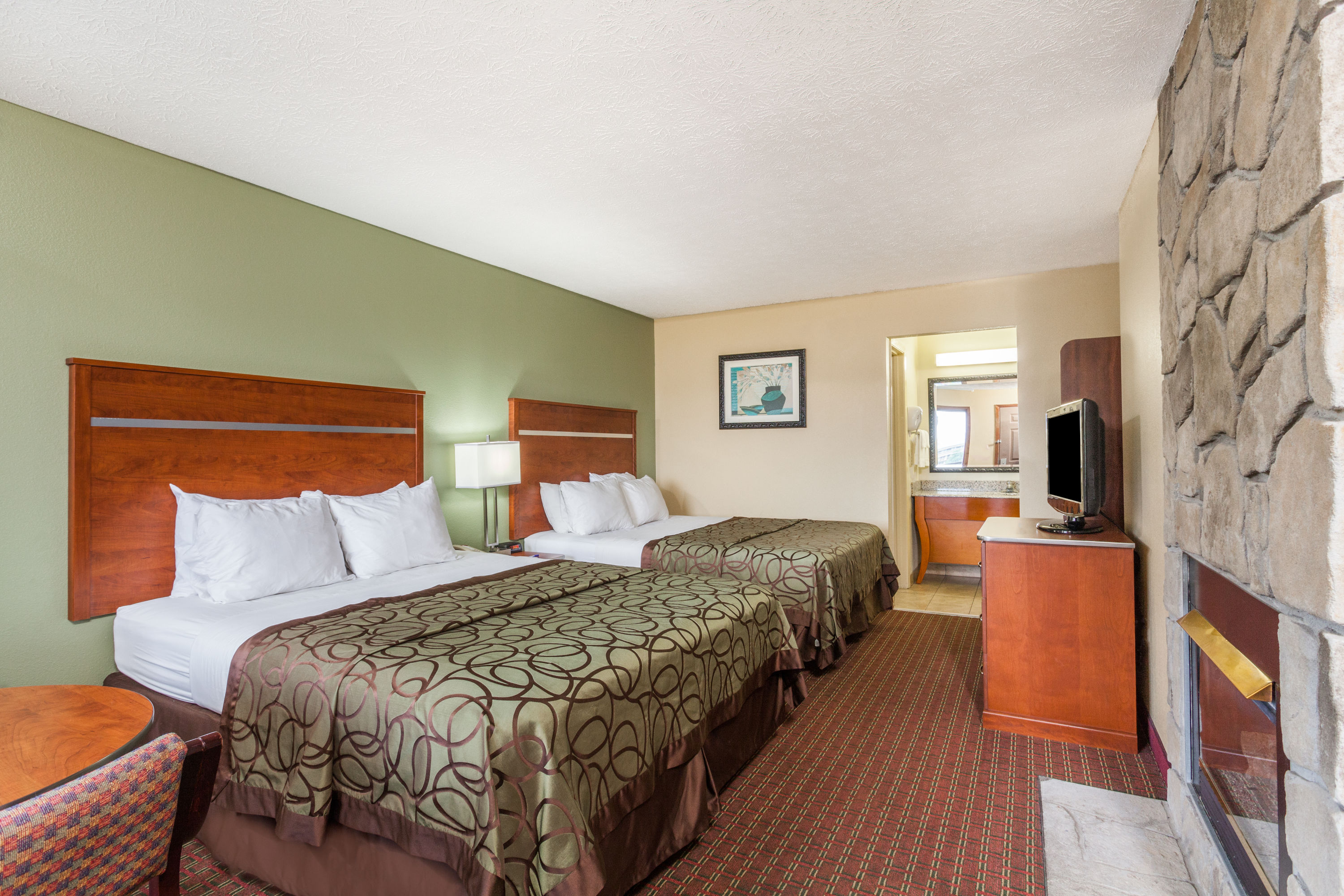 Guest room at the Baymont by Wyndham Pigeon Forge near Island Drive in Pigeon Forge, Tennessee