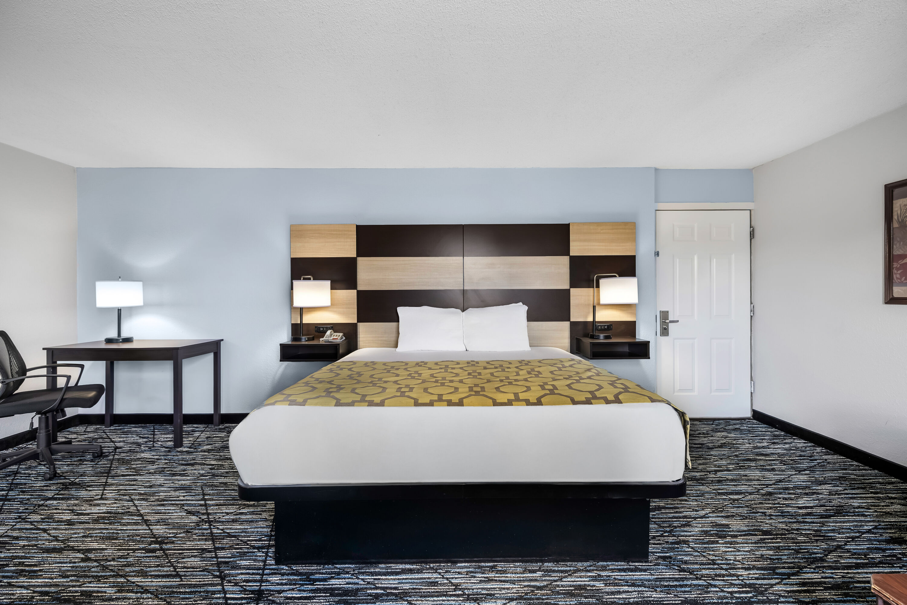 King bed guest room at the Baymont by Wyndham Sevierville Pigeon Forge in Sevierville, Tennessee