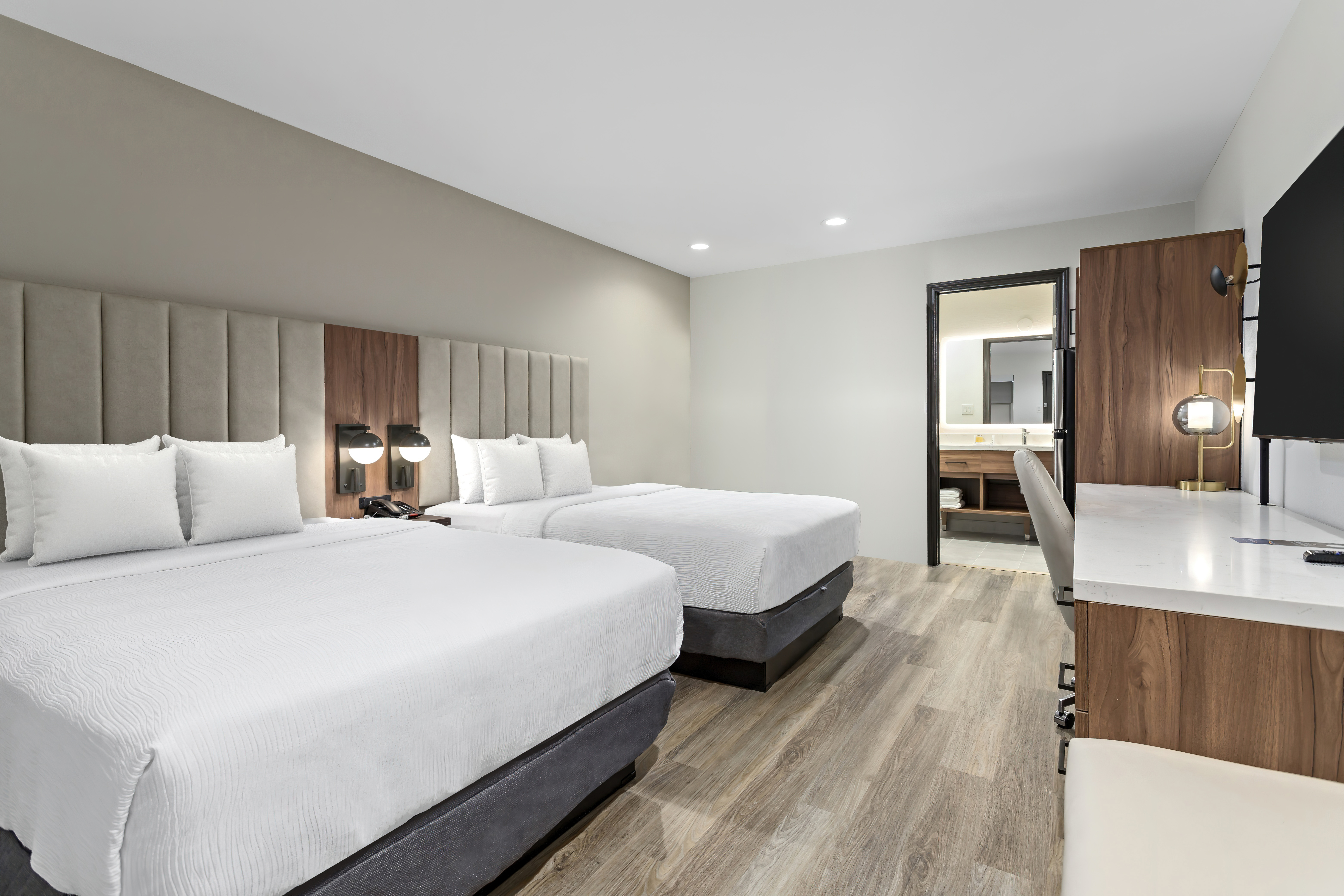 Guest room at the Baymont by Wyndham Beaumont in Beaumont, Texas