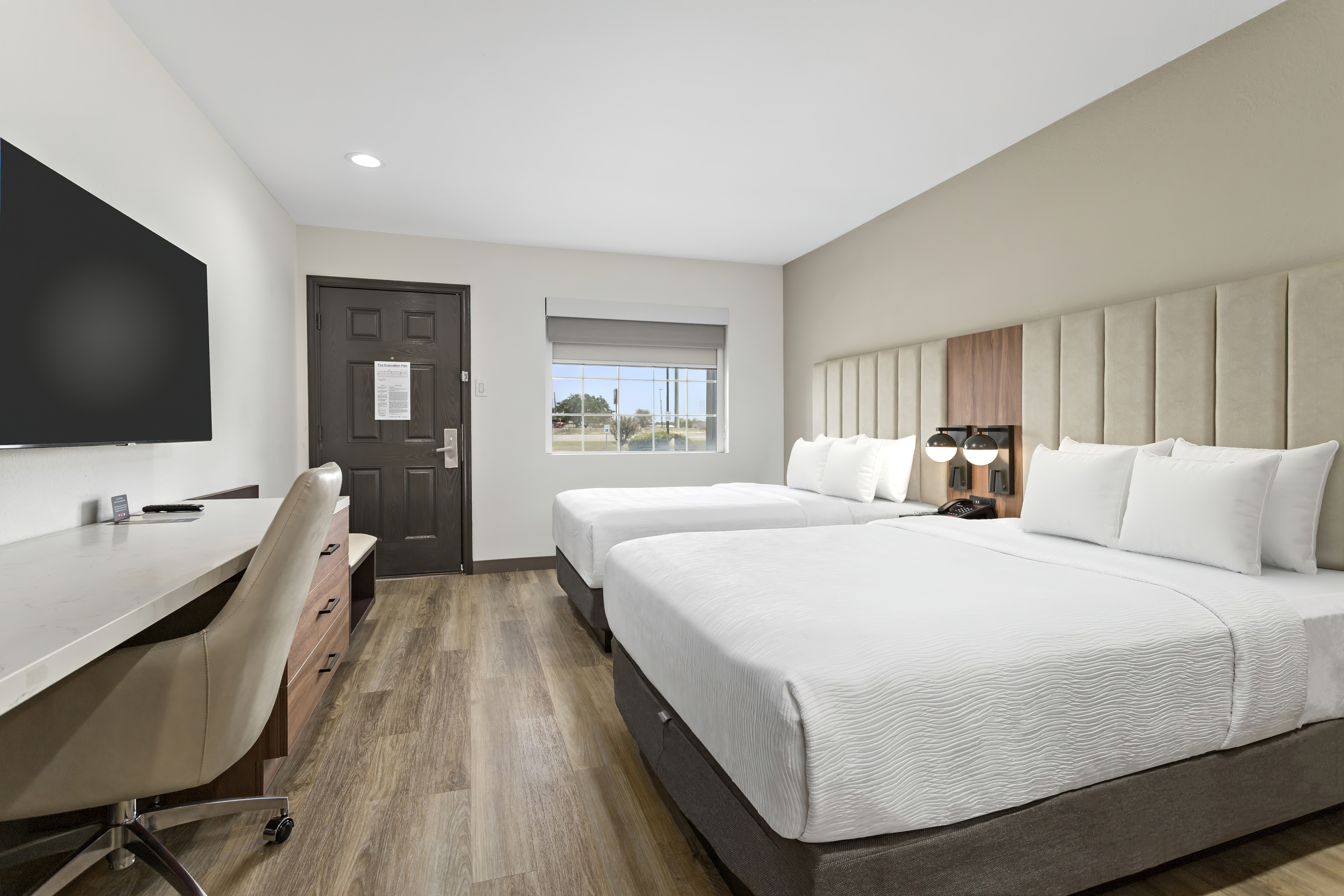 Guest room at the Baymont by Wyndham Beaumont in Beaumont, Texas