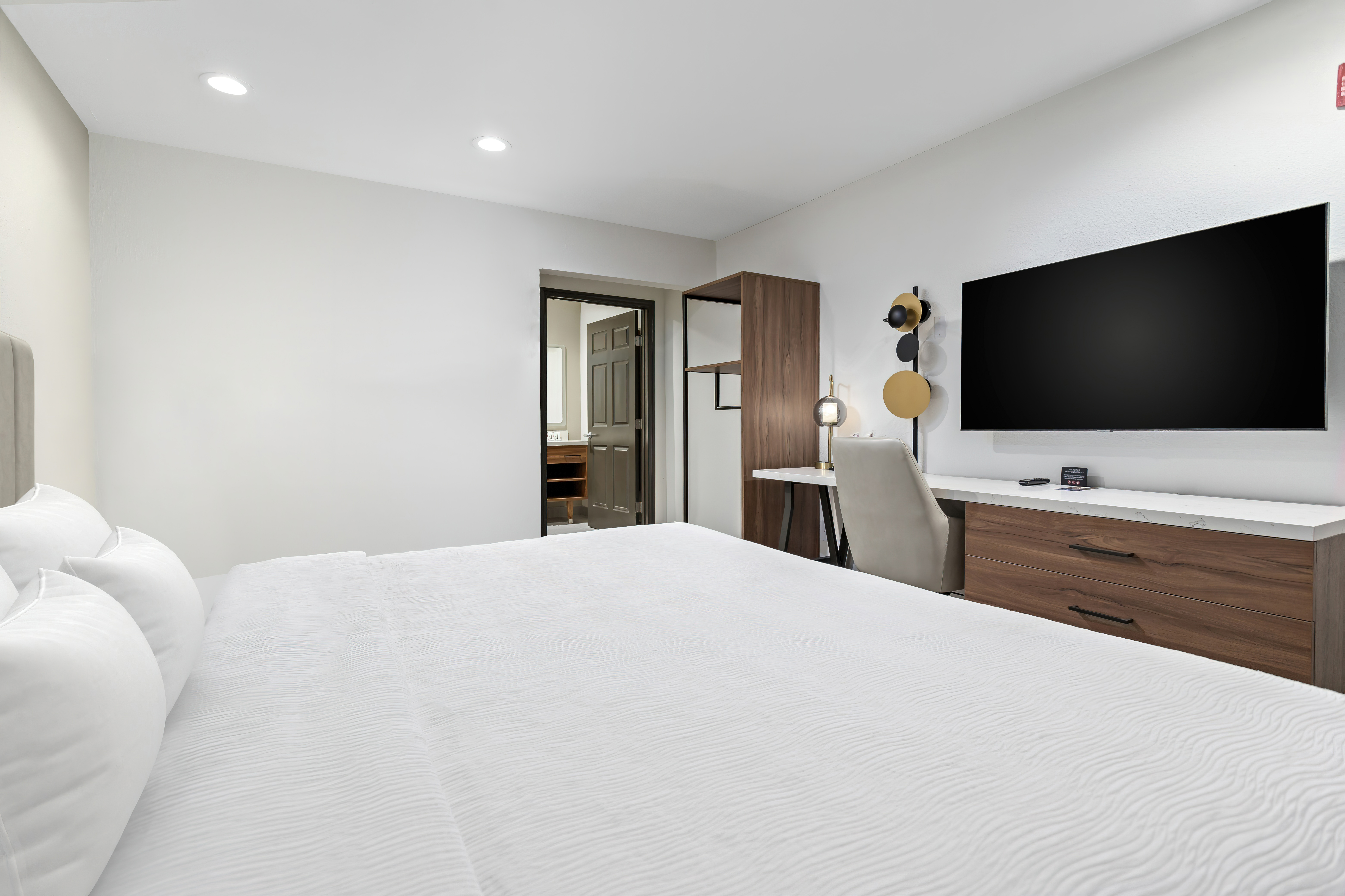 Guest room at the Baymont by Wyndham Beaumont in Beaumont, Texas