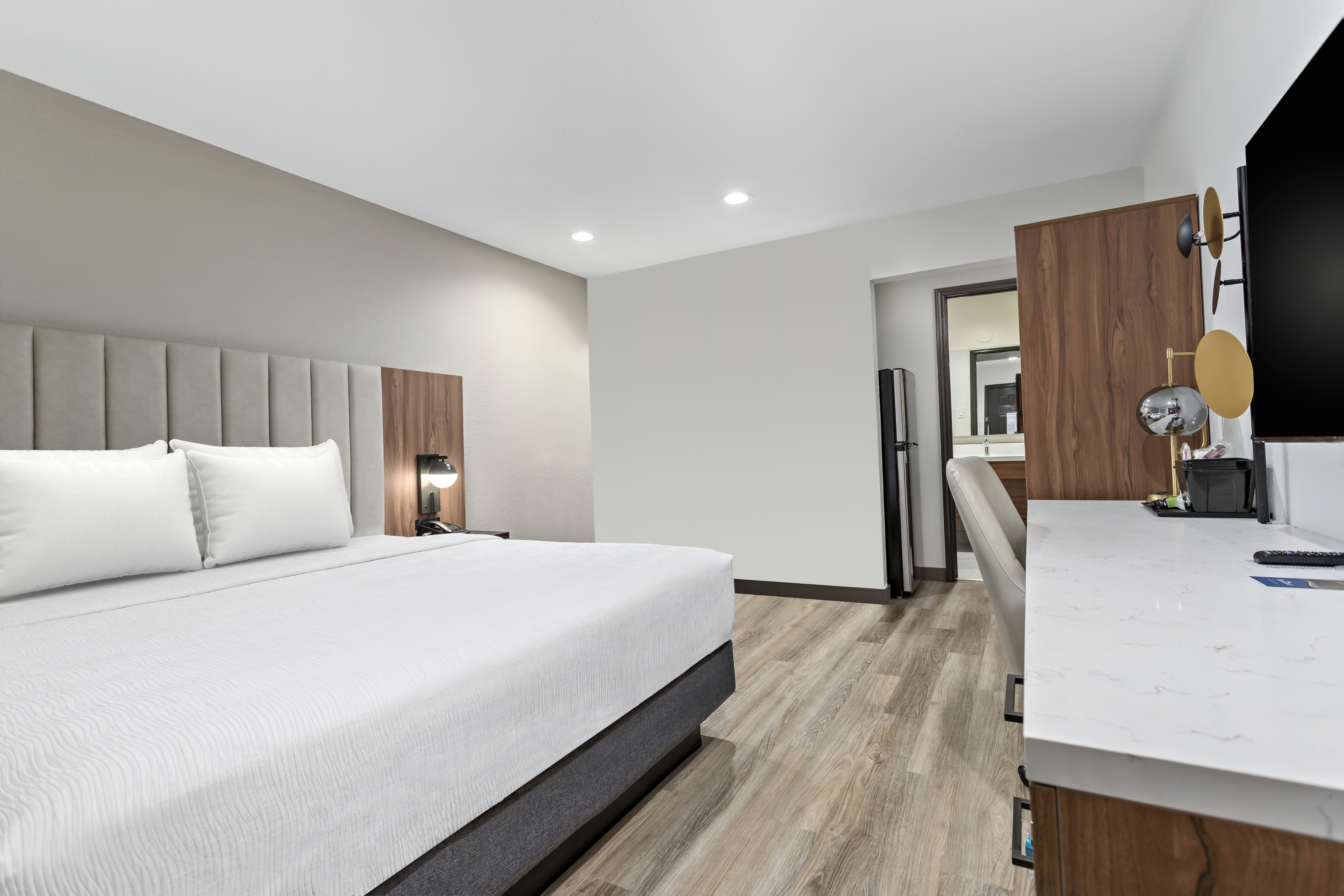 Guest room at the Baymont by Wyndham Beaumont in Beaumont, Texas