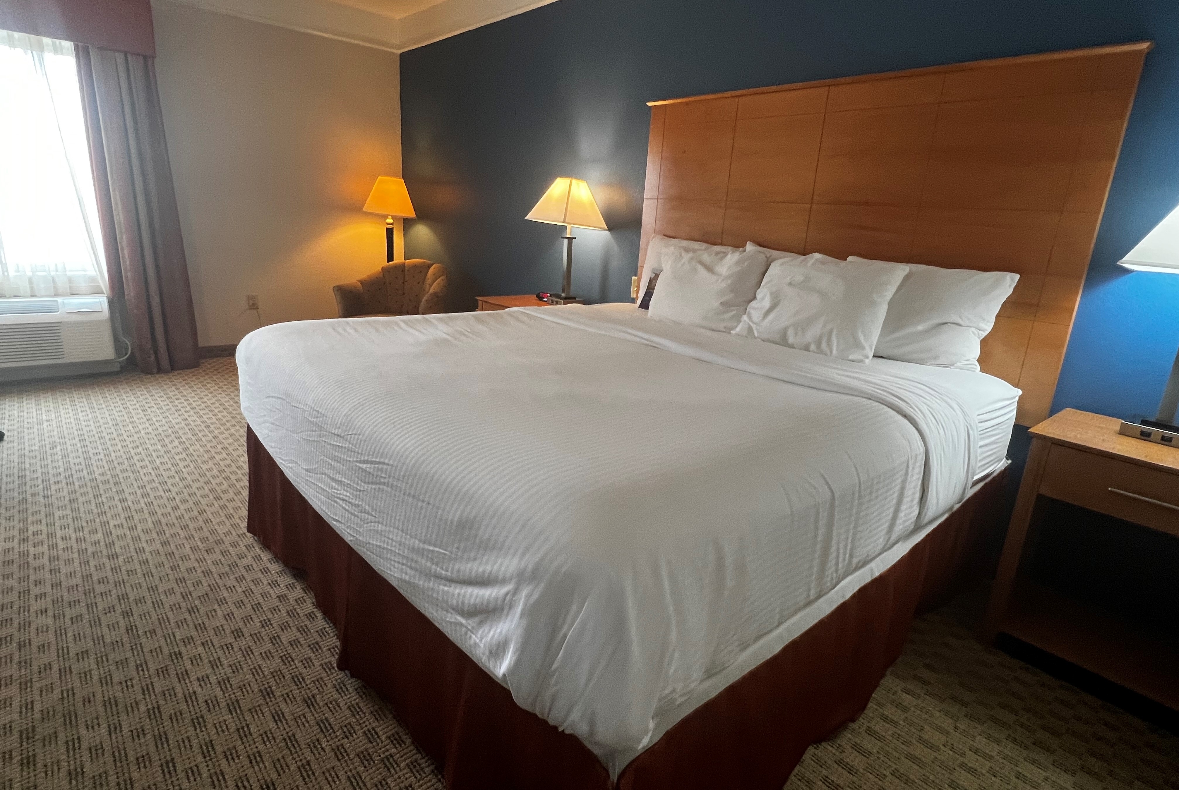 Guest room at the Baymont by Wyndham Brenham in Brenham, Texas