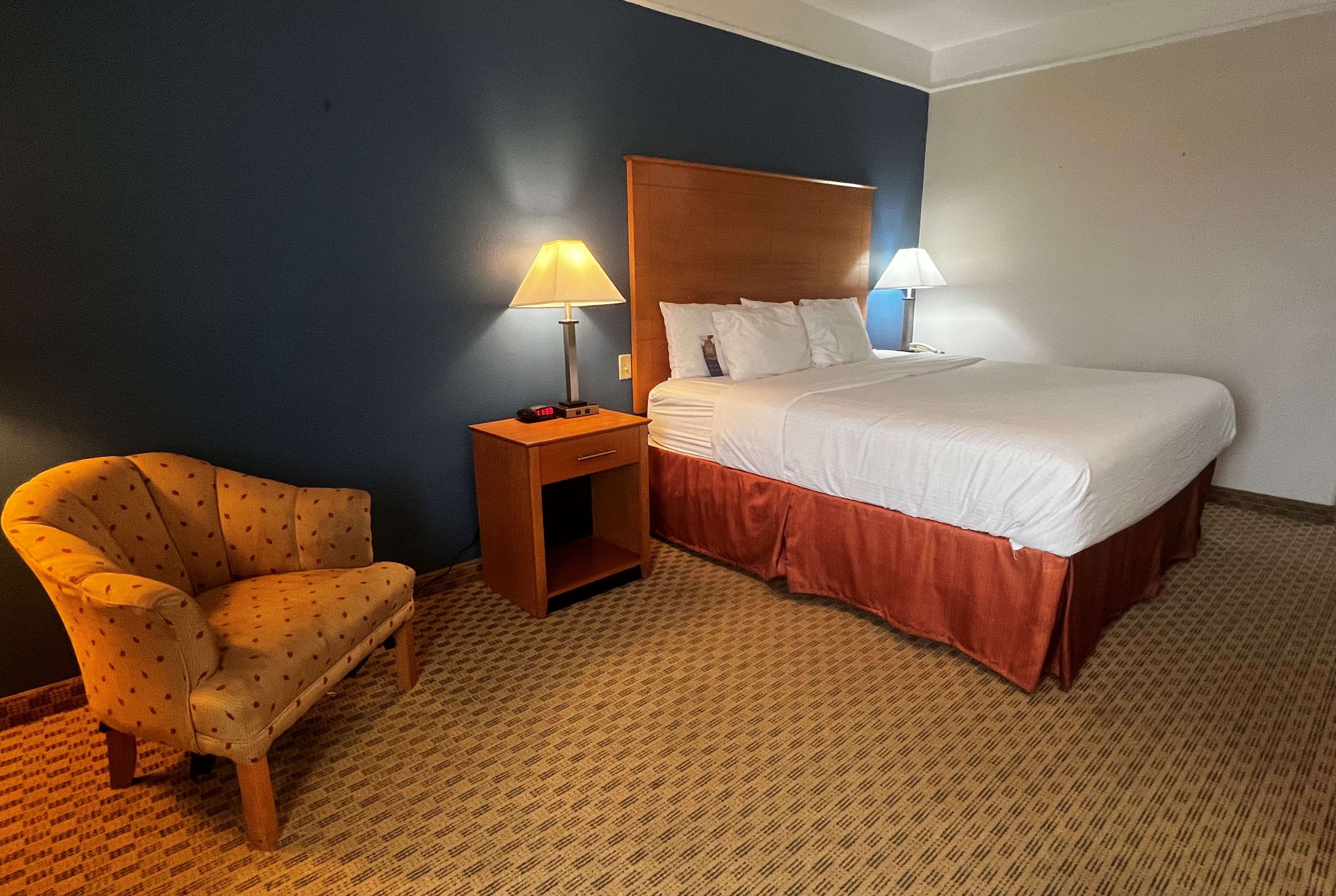 Guest room at the Baymont by Wyndham Brenham in Brenham, Texas