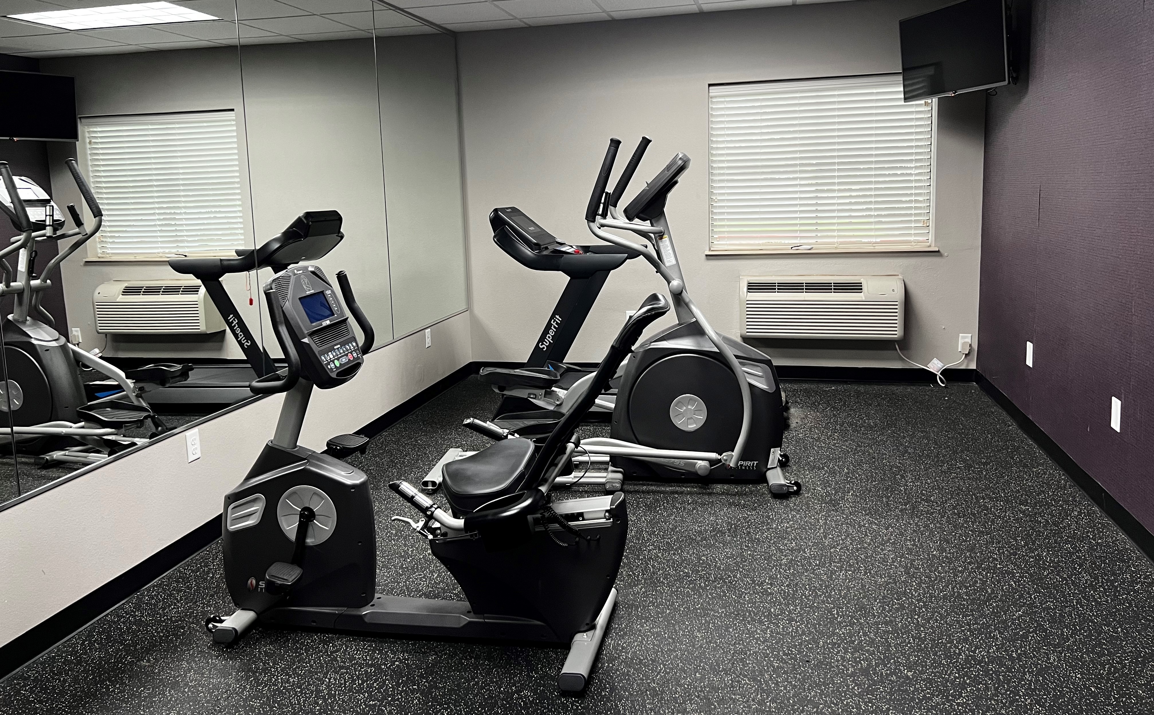 Fitness room at Baymont by Wyndham College Station in College Station, Texas