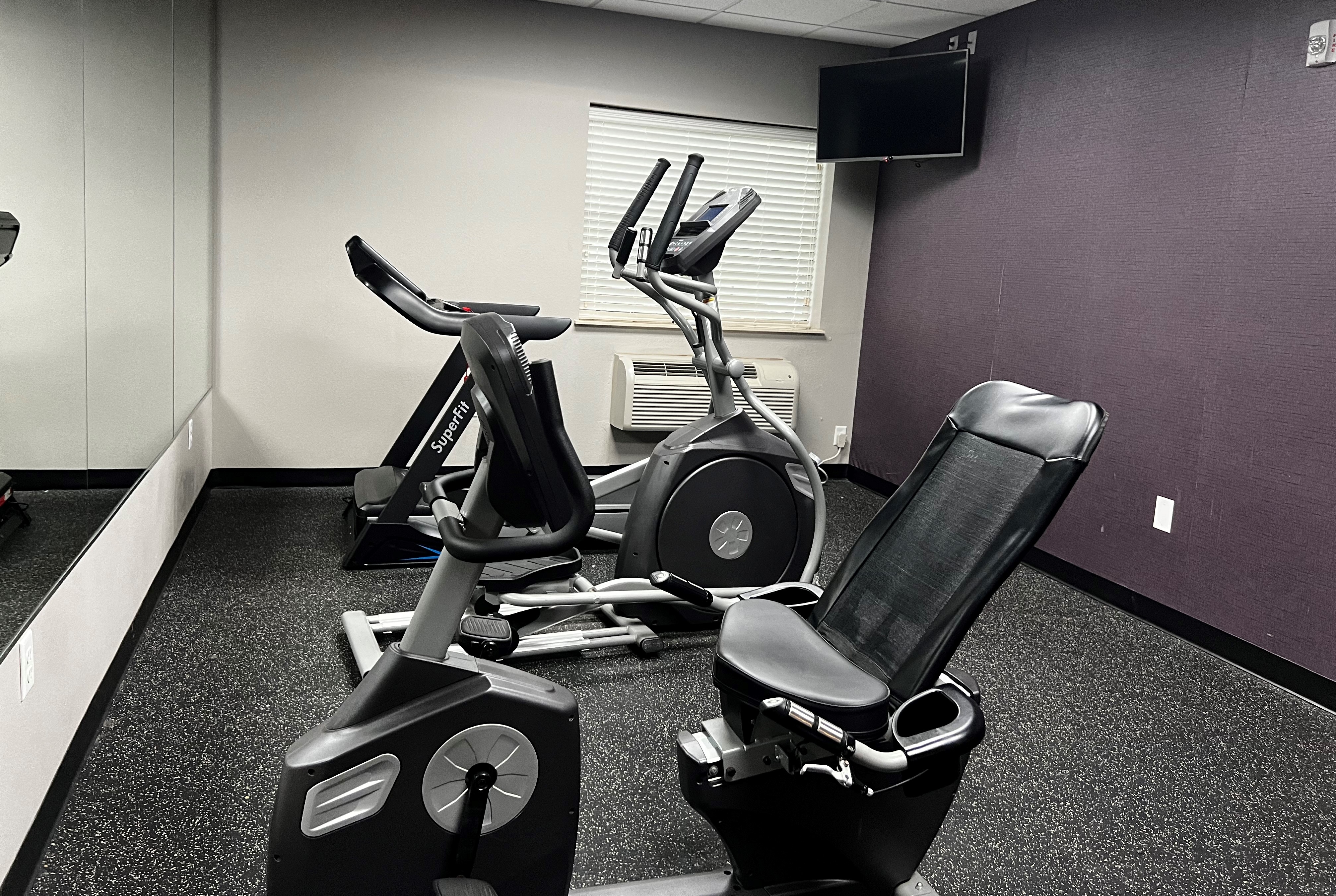 Fitness room at Baymont by Wyndham College Station in College Station, Texas