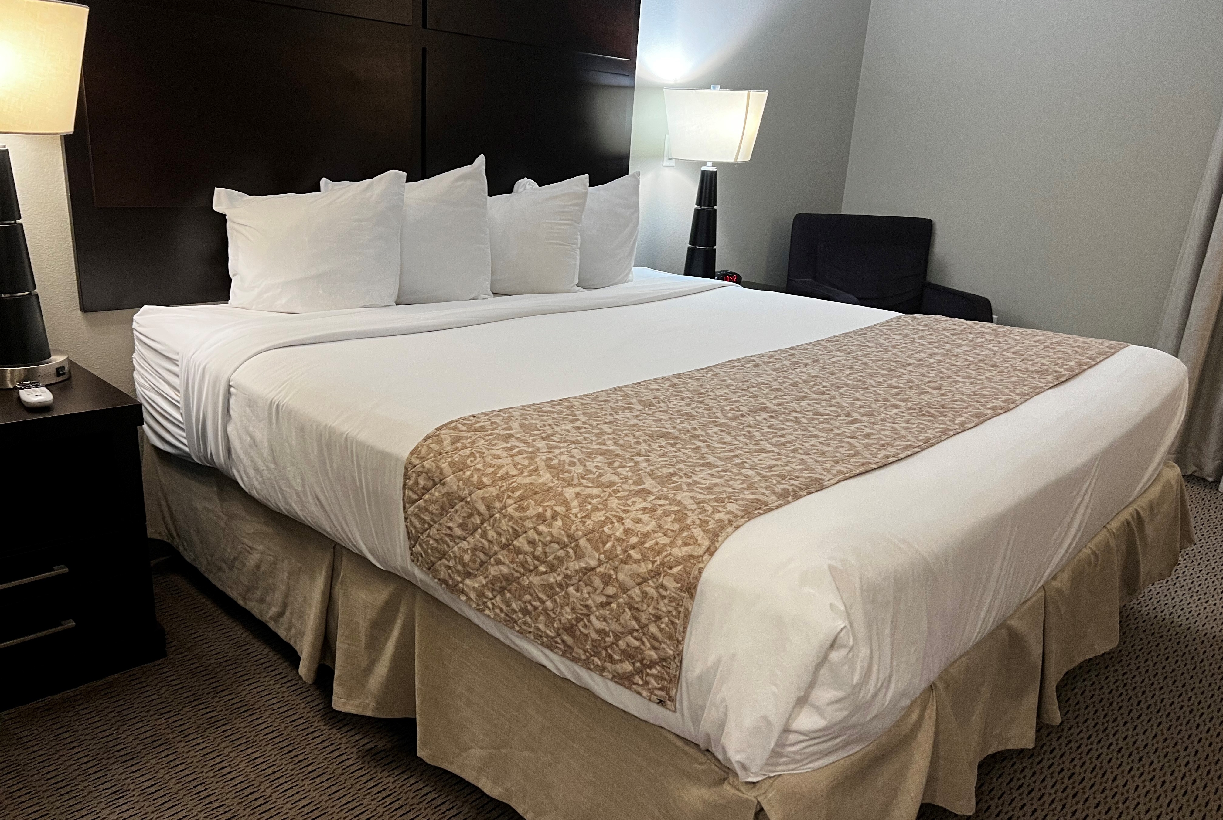 Guest room at the Baymont by Wyndham College Station in College Station, Texas