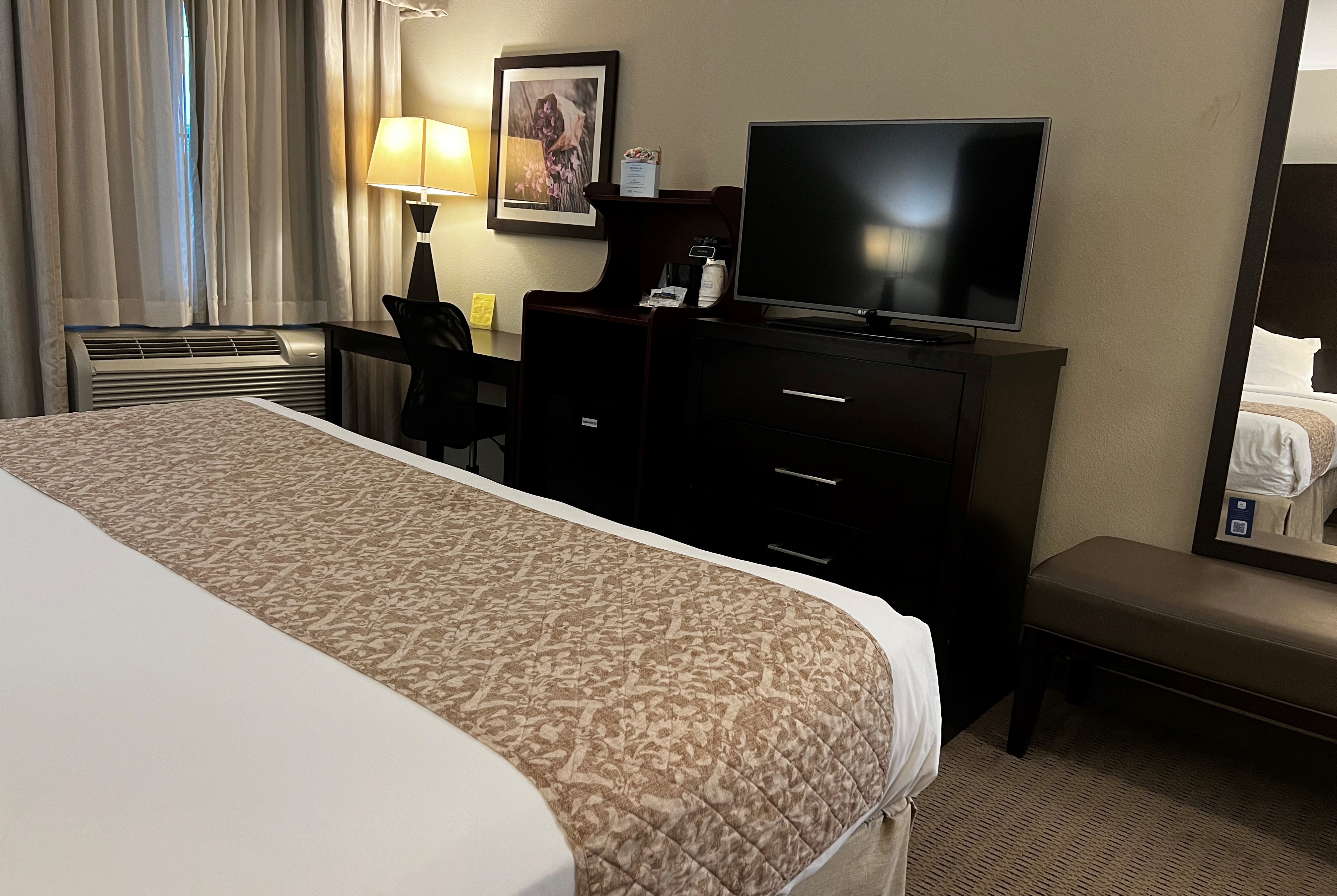 Guest room at the Baymont by Wyndham College Station in College Station, Texas