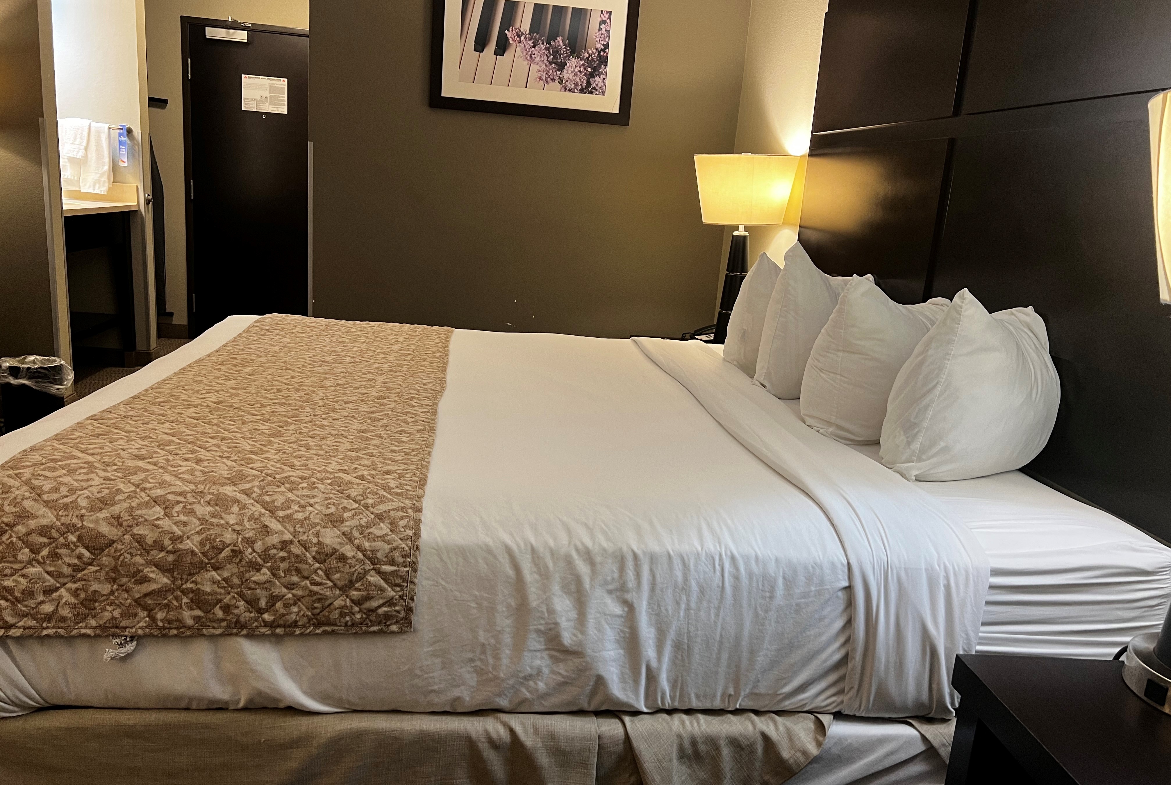 Guest room at the Baymont by Wyndham College Station in College Station, Texas