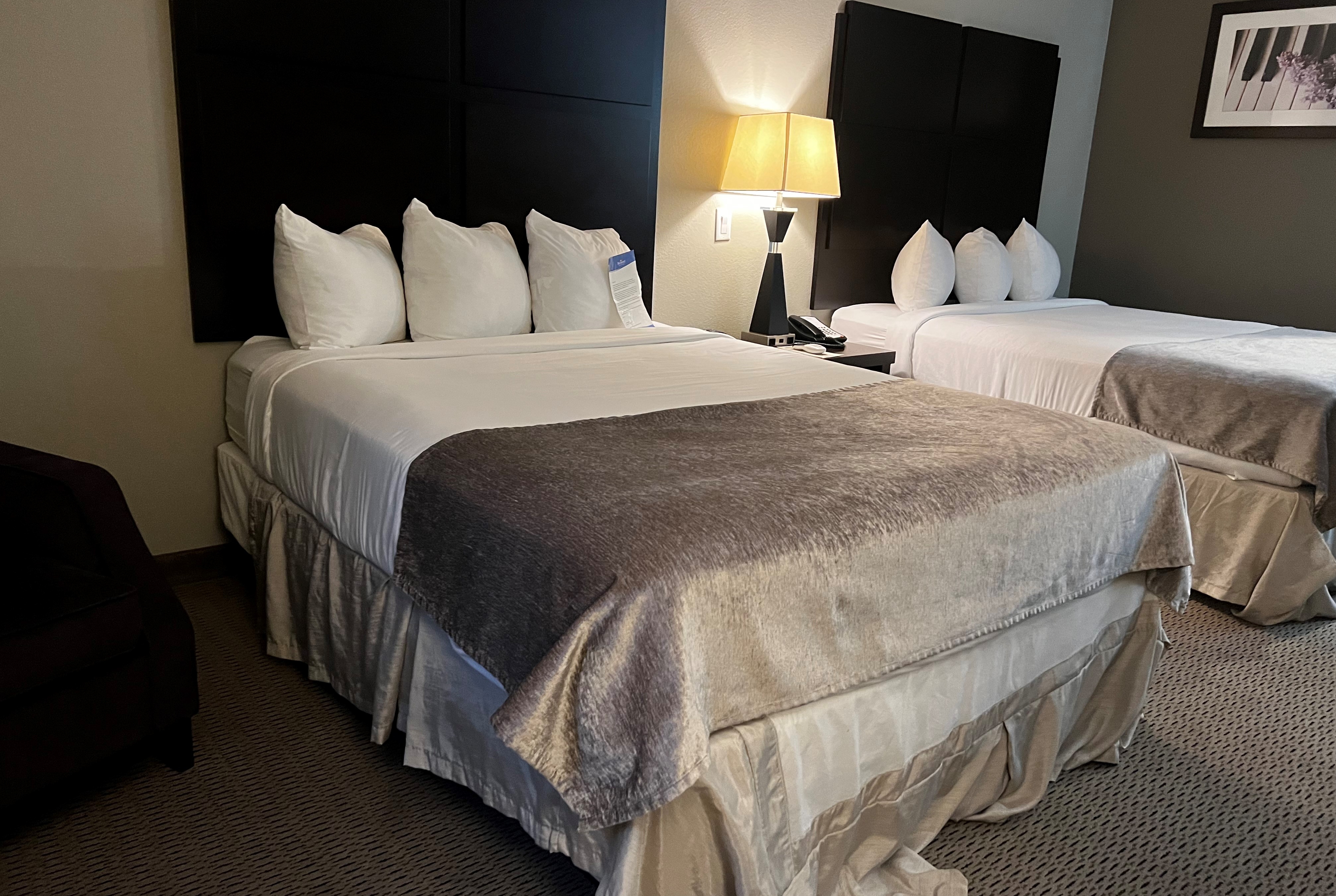 Guest room at the Baymont by Wyndham College Station in College Station, Texas