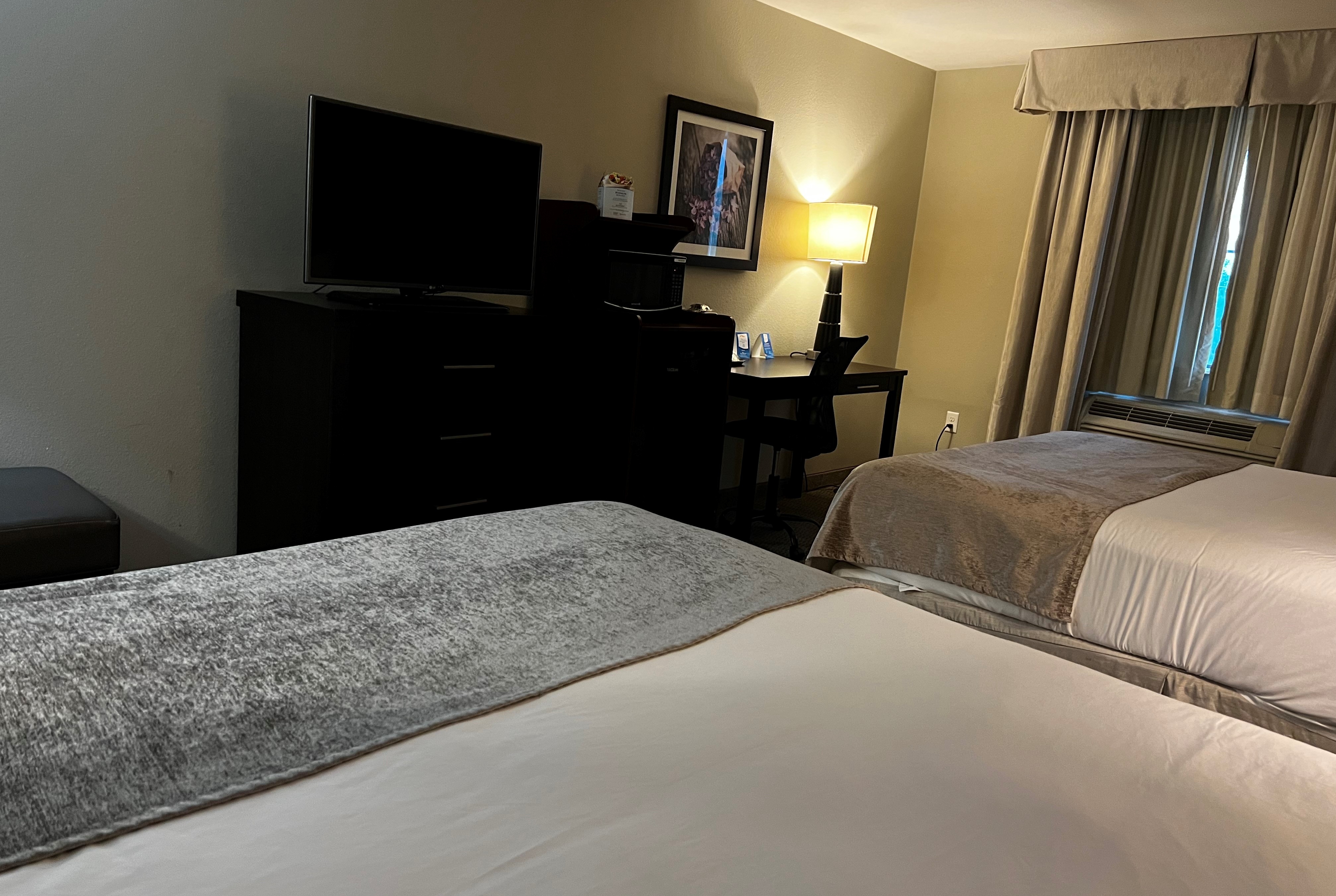 Guest room at the Baymont by Wyndham College Station in College Station, Texas
