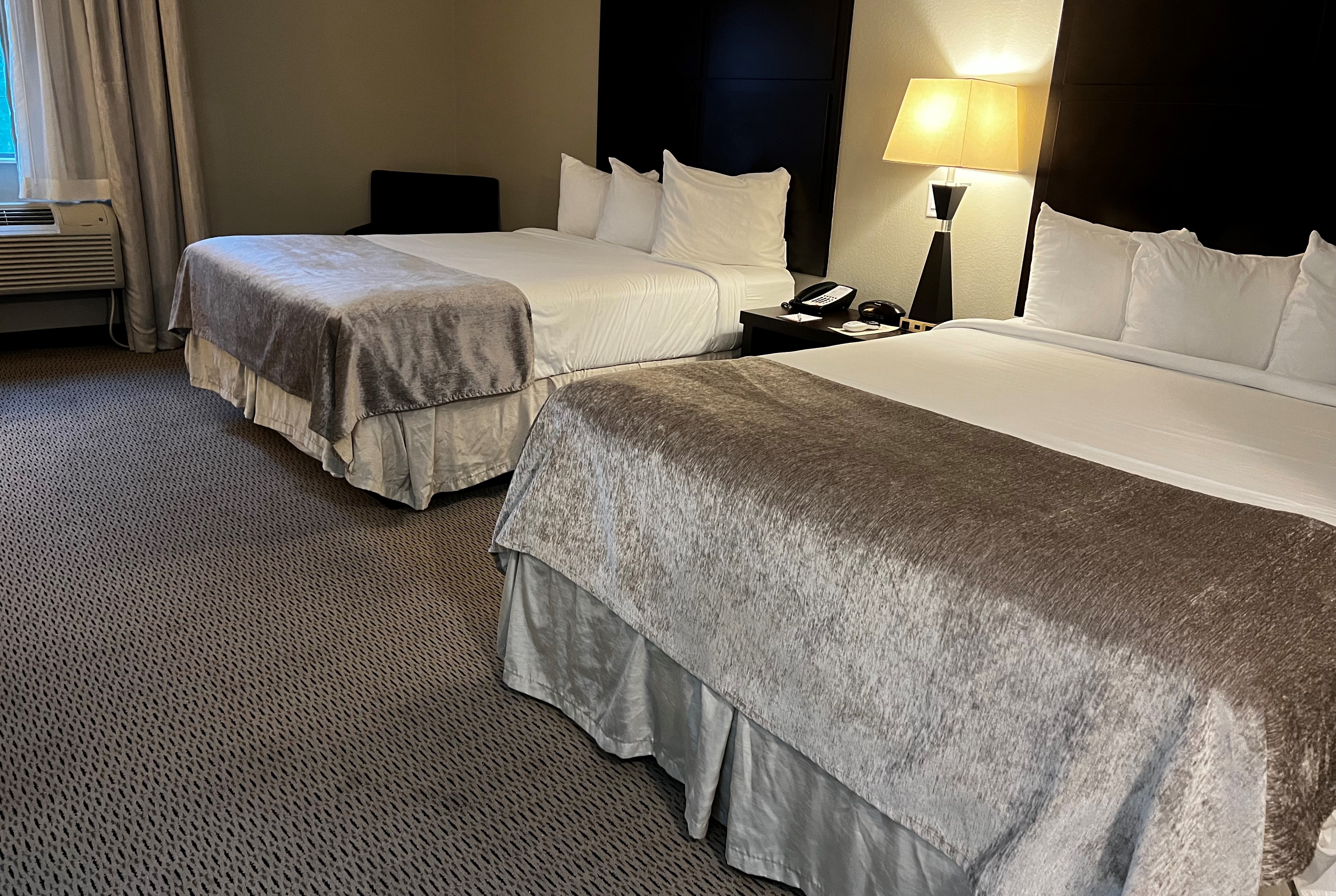 Guest room at the Baymont by Wyndham College Station in College Station, Texas