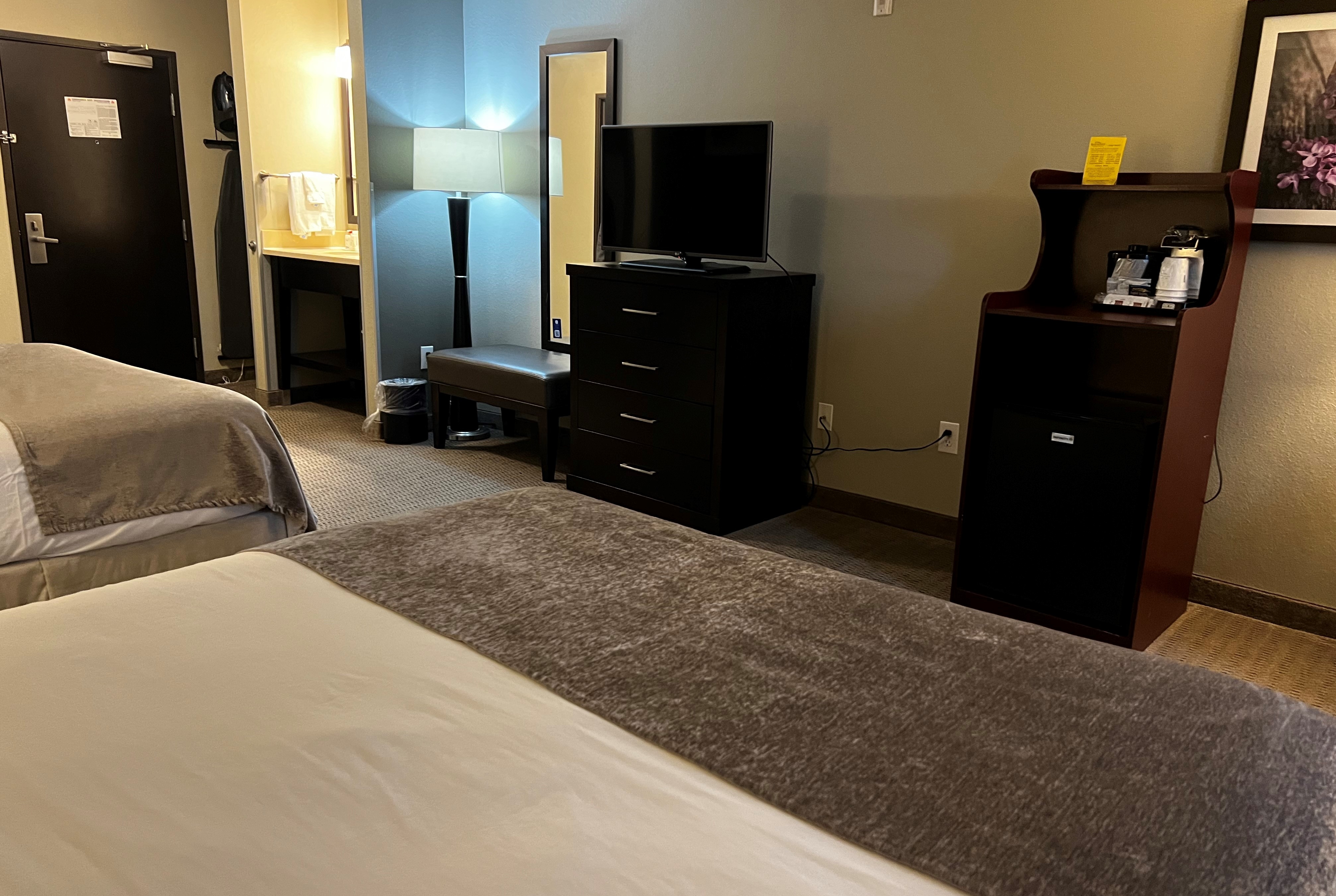 Guest room at the Baymont by Wyndham College Station in College Station, Texas