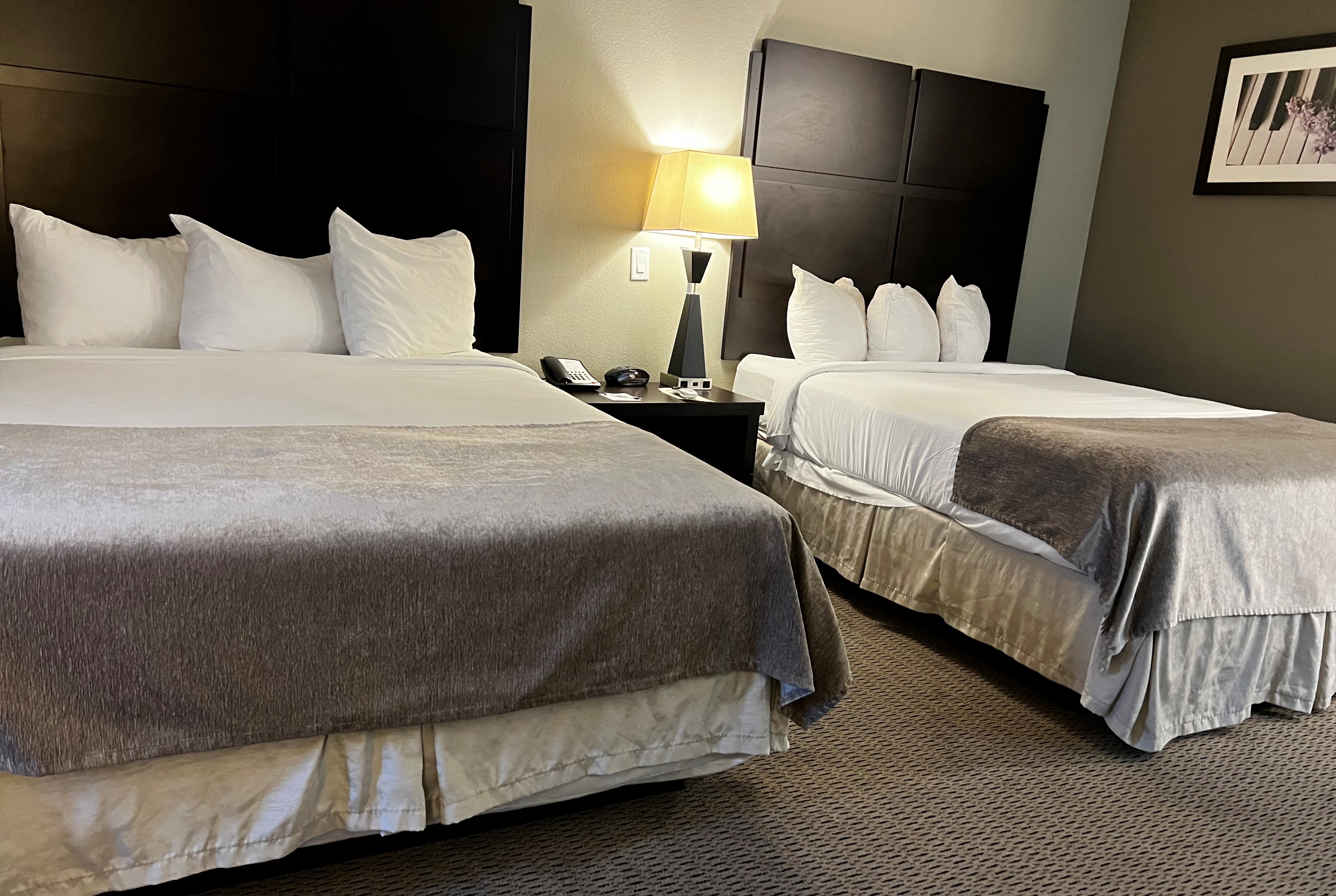 Guest room at the Baymont by Wyndham College Station in College Station, Texas
