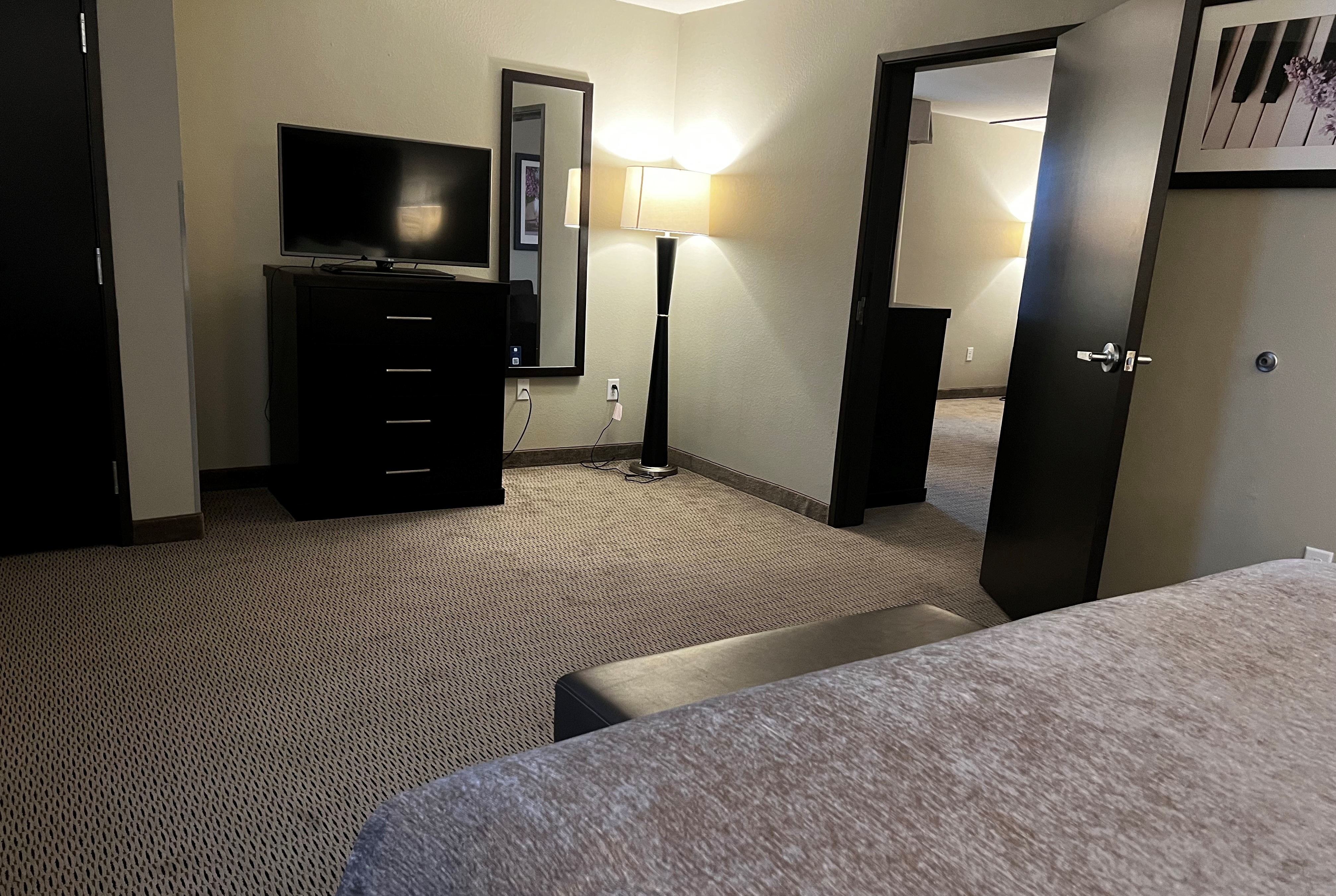 Guest room at the Baymont by Wyndham College Station in College Station, Texas