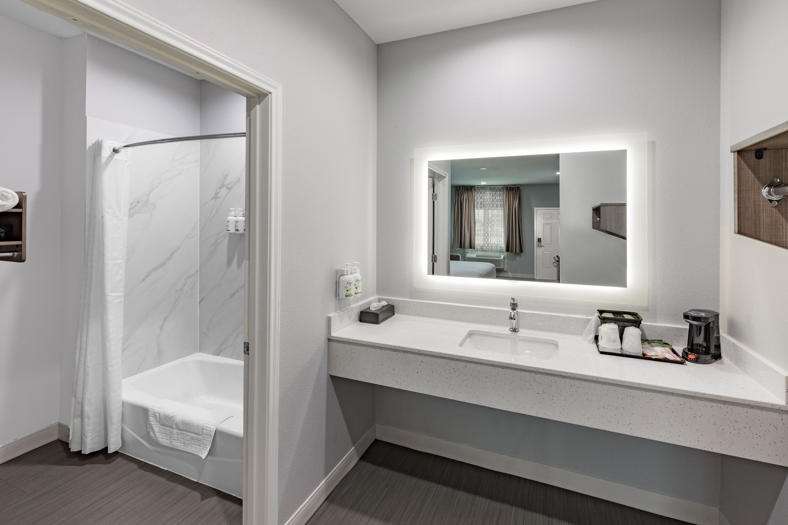 Guest room bath at the Baymont by Wyndham Freeport Texas in Freeport, Texas