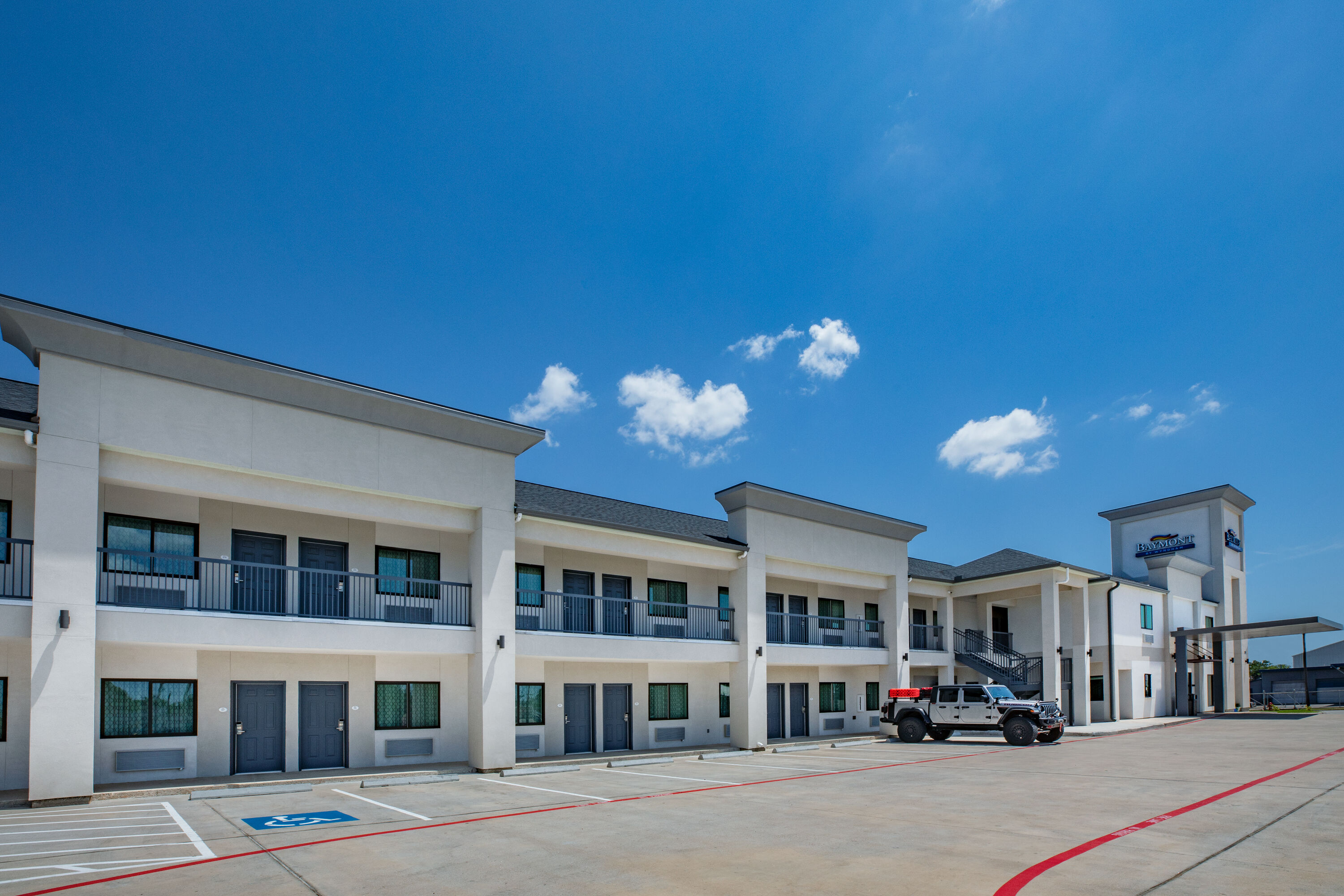 Exterior Day Image of Baymont by Wyndham Freeport Texas hotel in Freeport, Texas